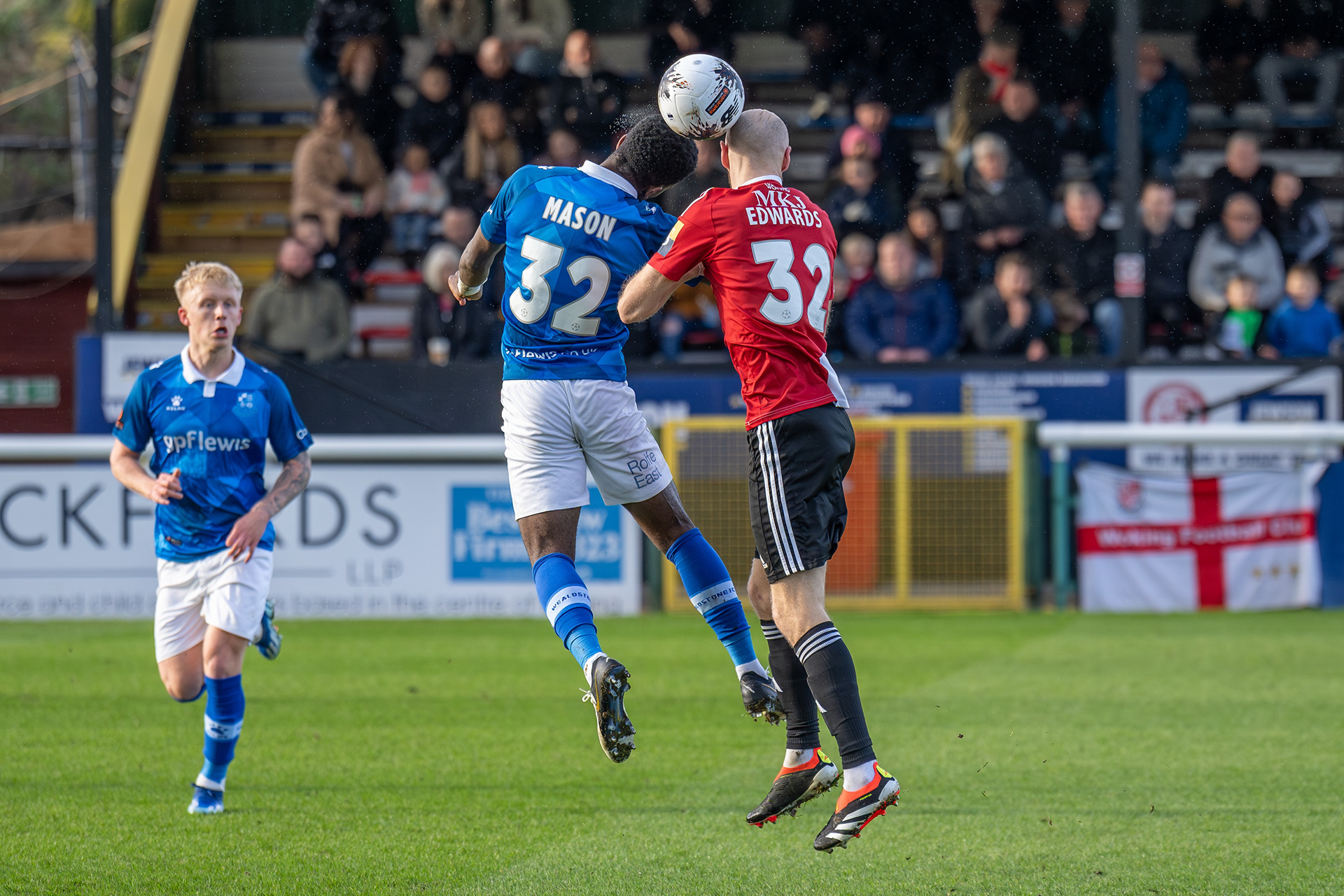 Brandon Mason battles Edwards for the ball