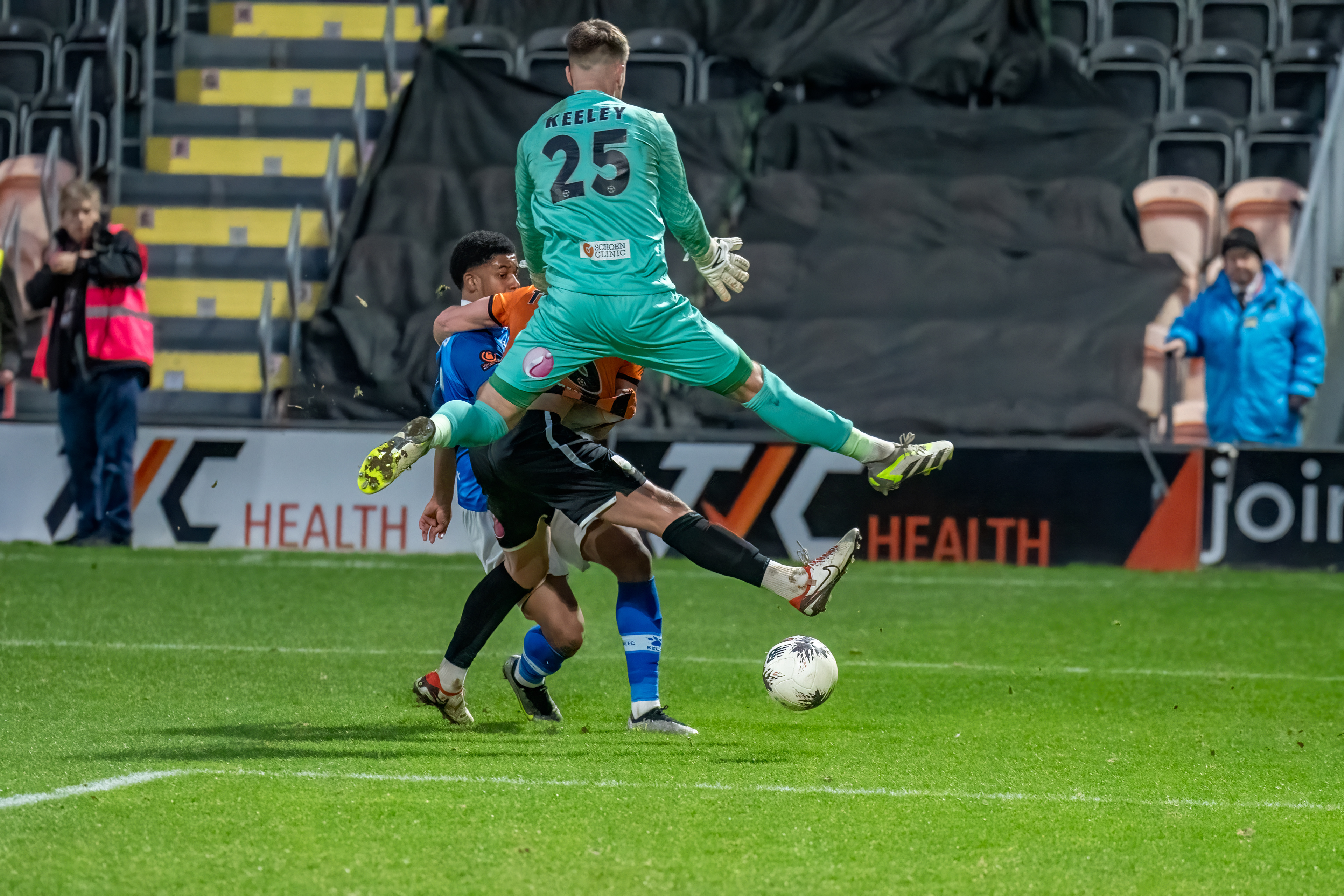 ...... and Corrie Andrews calmly passes the ball......