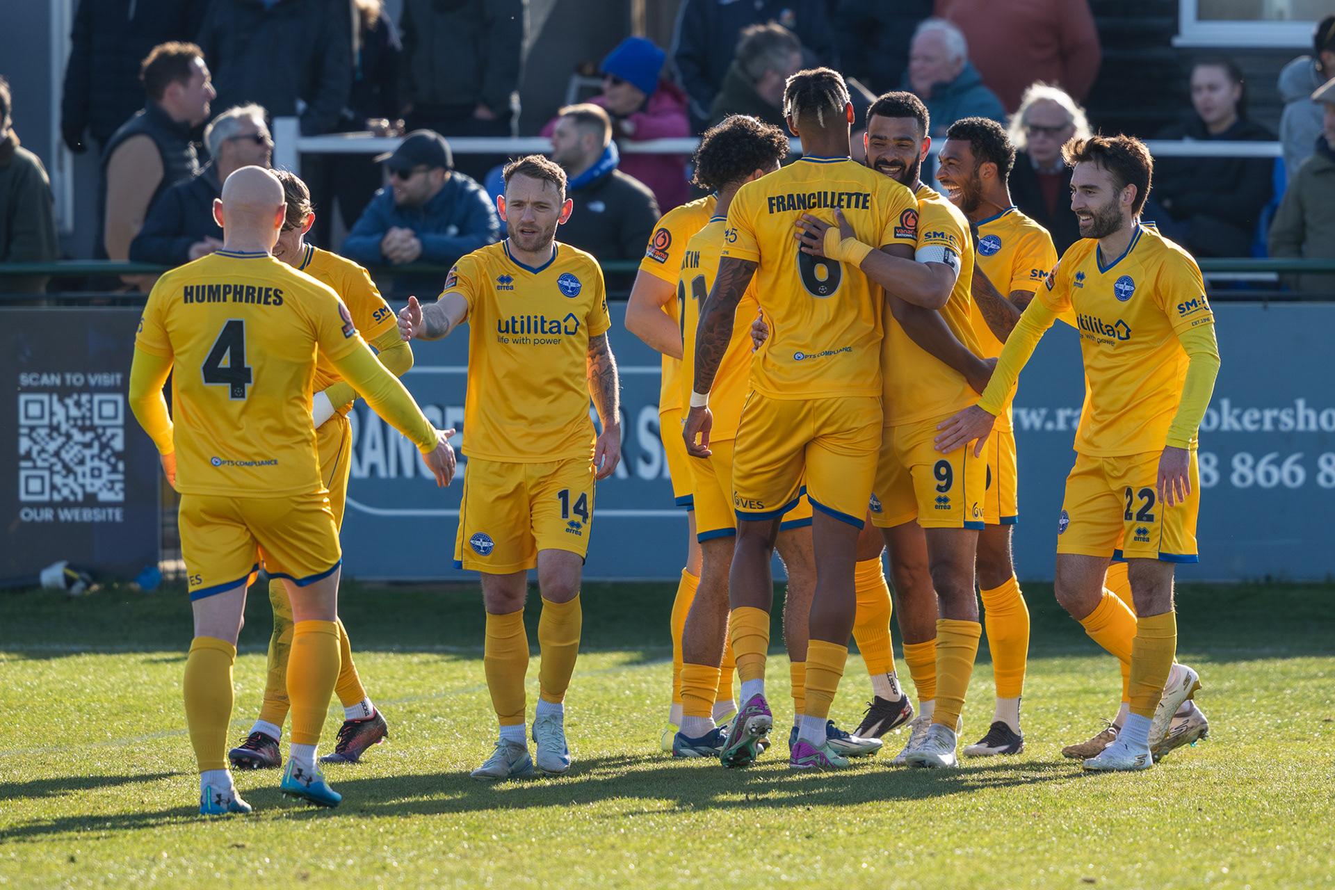 Eastleigh players congratulate Fracilette