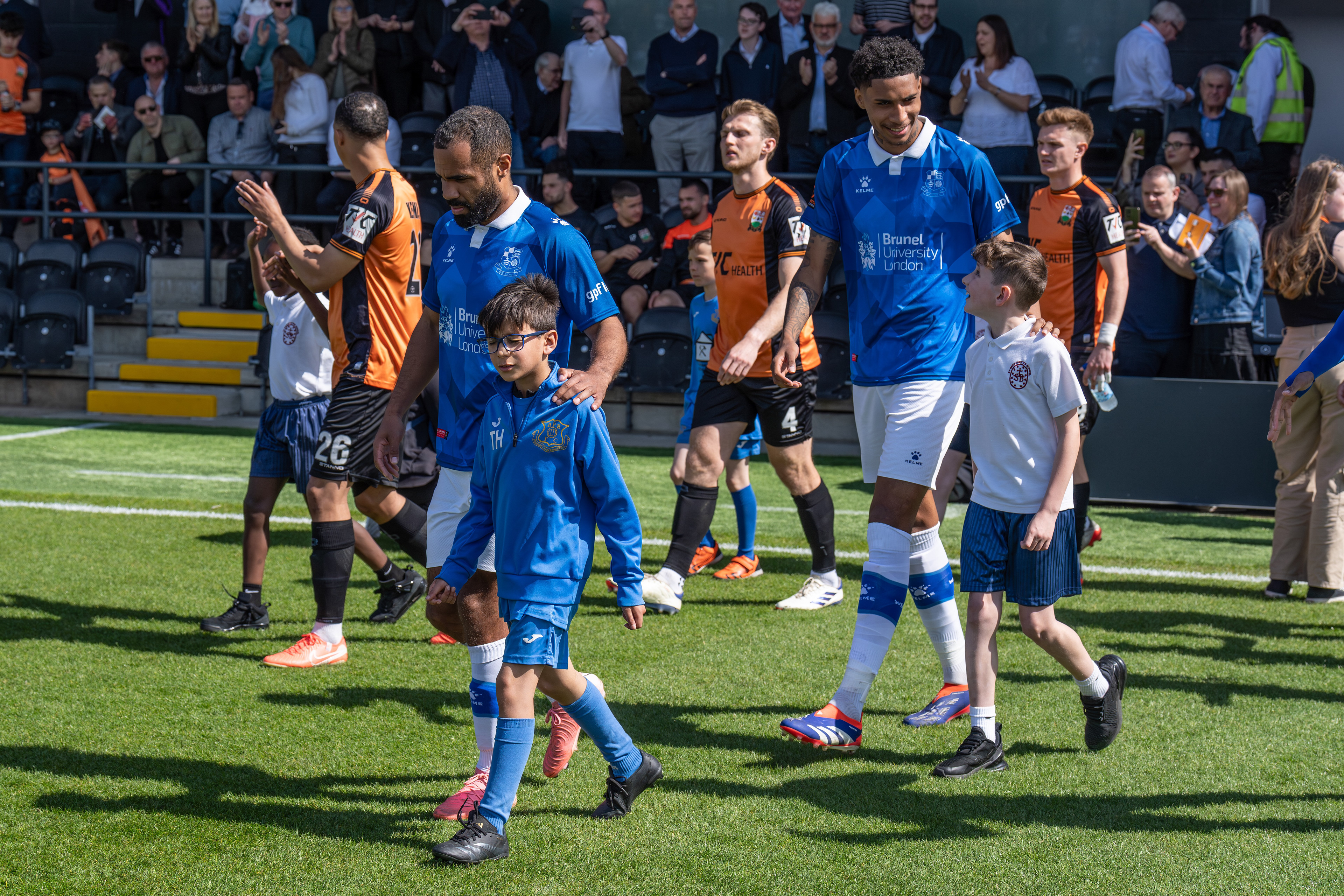 Alex Dyer and Deon Woodman with mascots