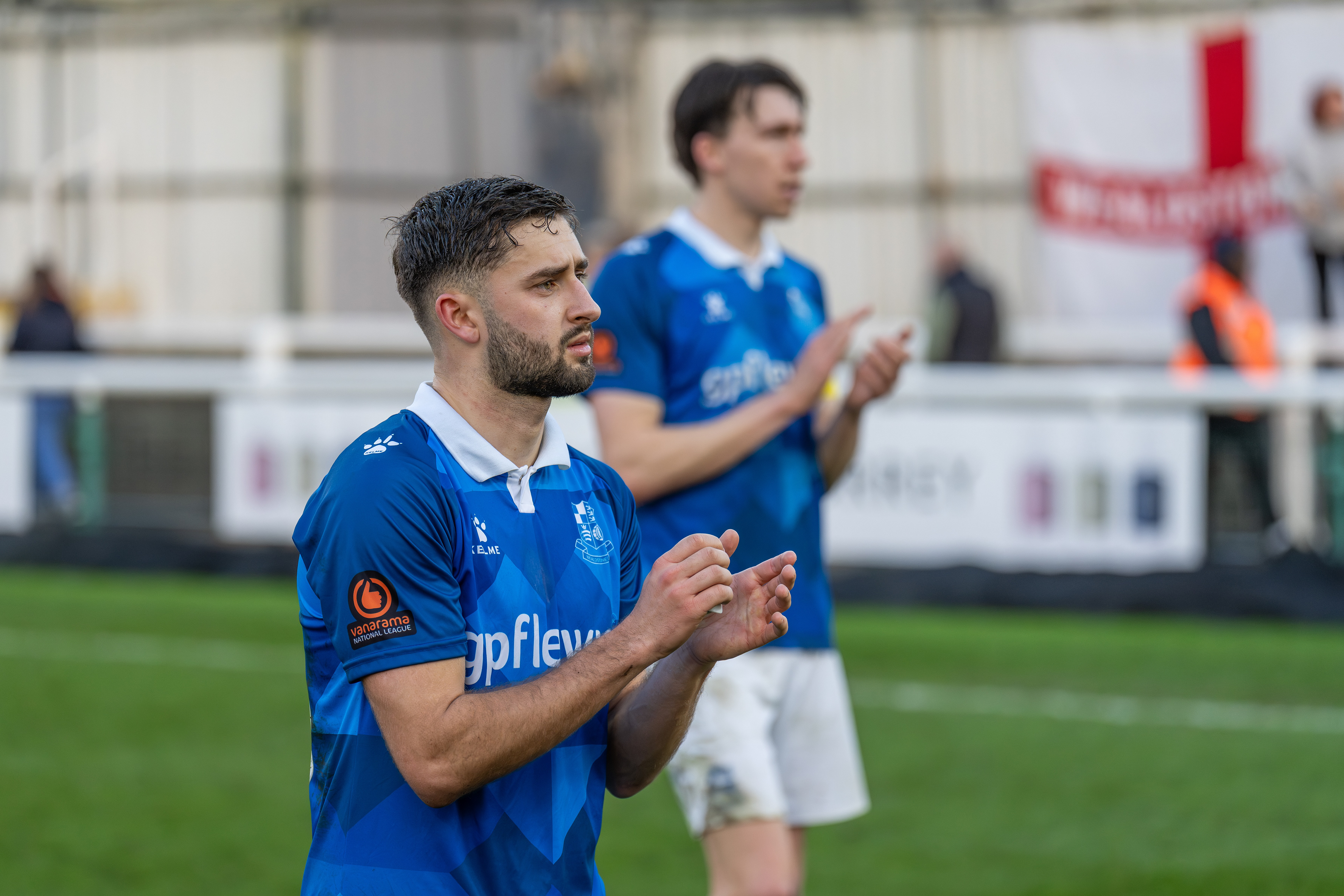 Aaron Henry and Jack Cook applaud the Stones fans