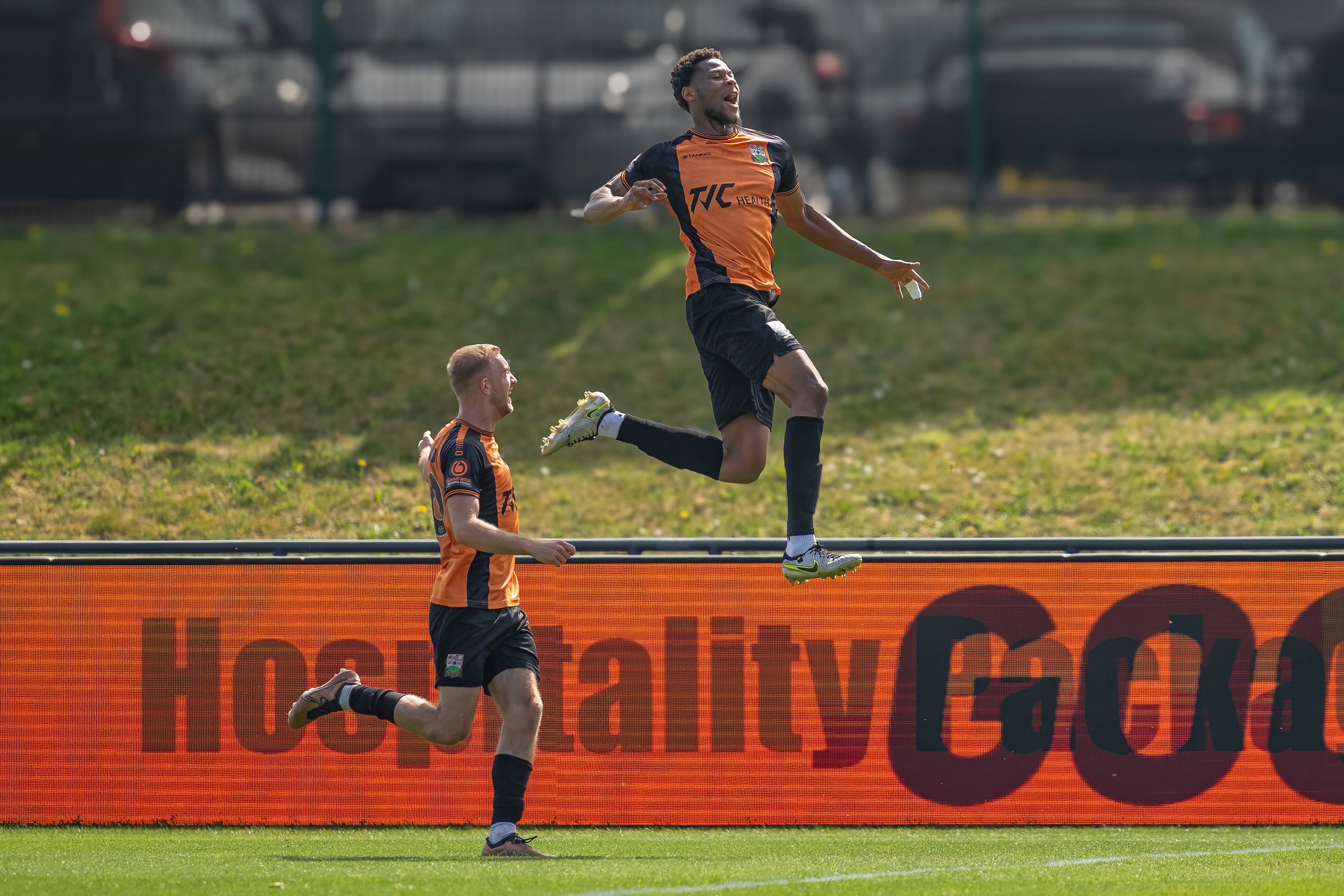 Adebola Oluwo leaps high to celebrate putting the Bees 1-0 up