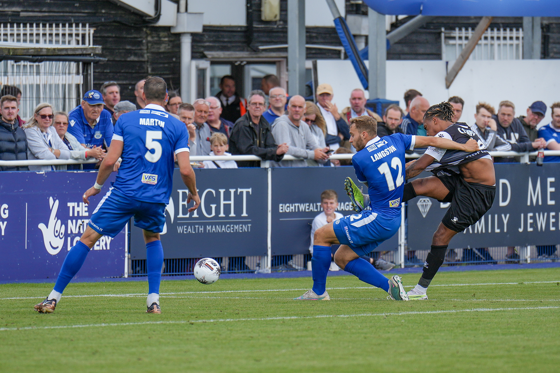 Tahvon Campbell gets a shot away under pressure