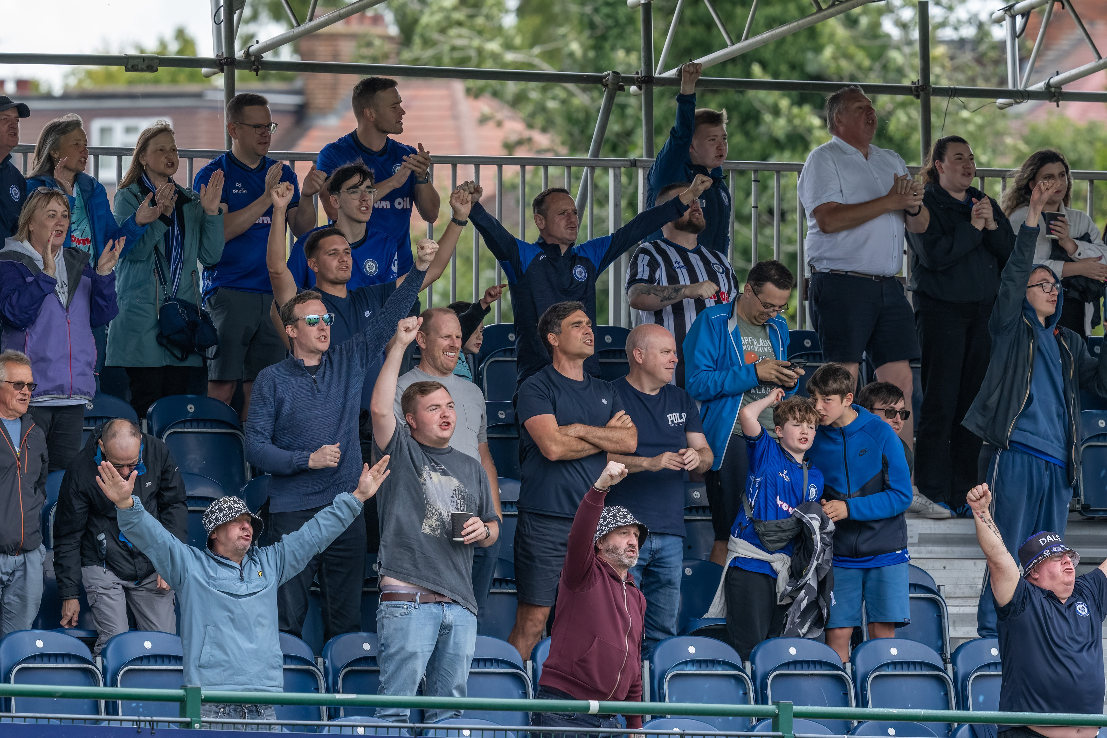 Dale fans celebrate the early lead at the Vale