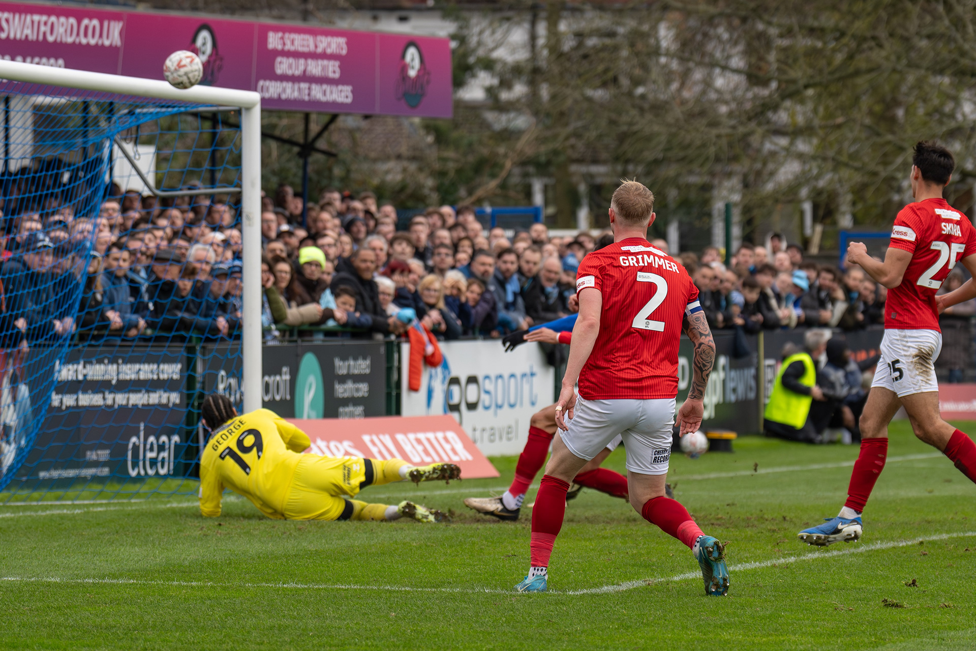 Alex Reid (obscured) shoots agonisingly over the bar