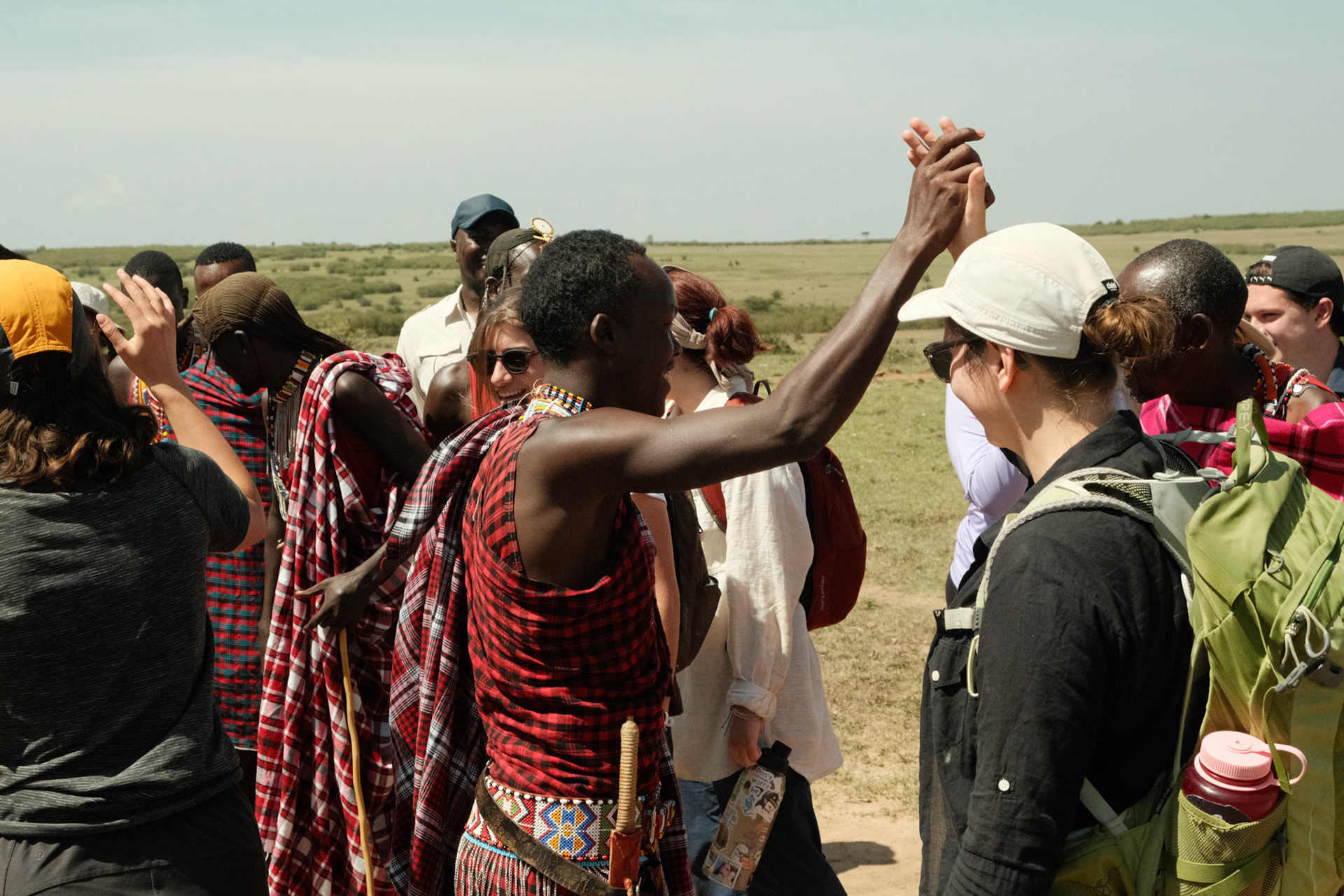 Greetings between AFSS students and Maasai men