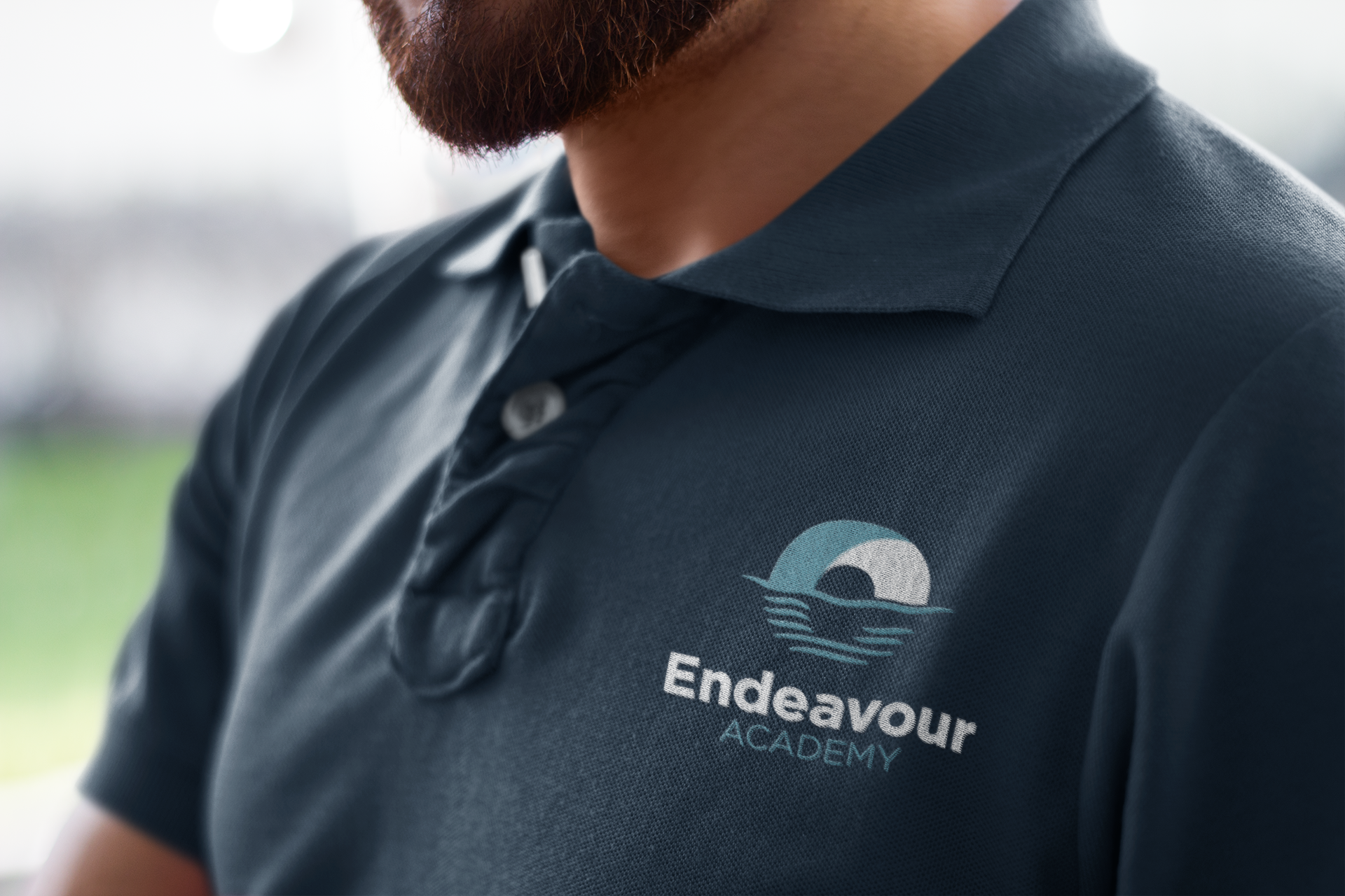 Endeavour Academy school logo on a sweatshirt navy