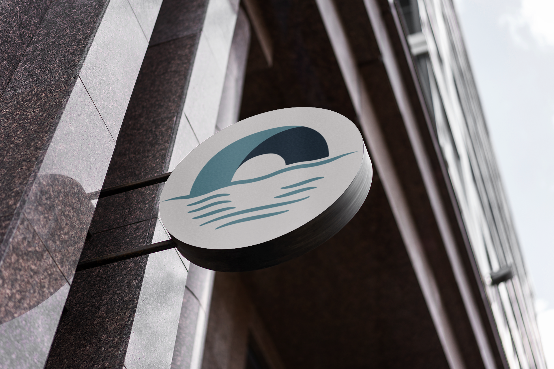 close up of endeavour academy logo mark in a round sign with no text