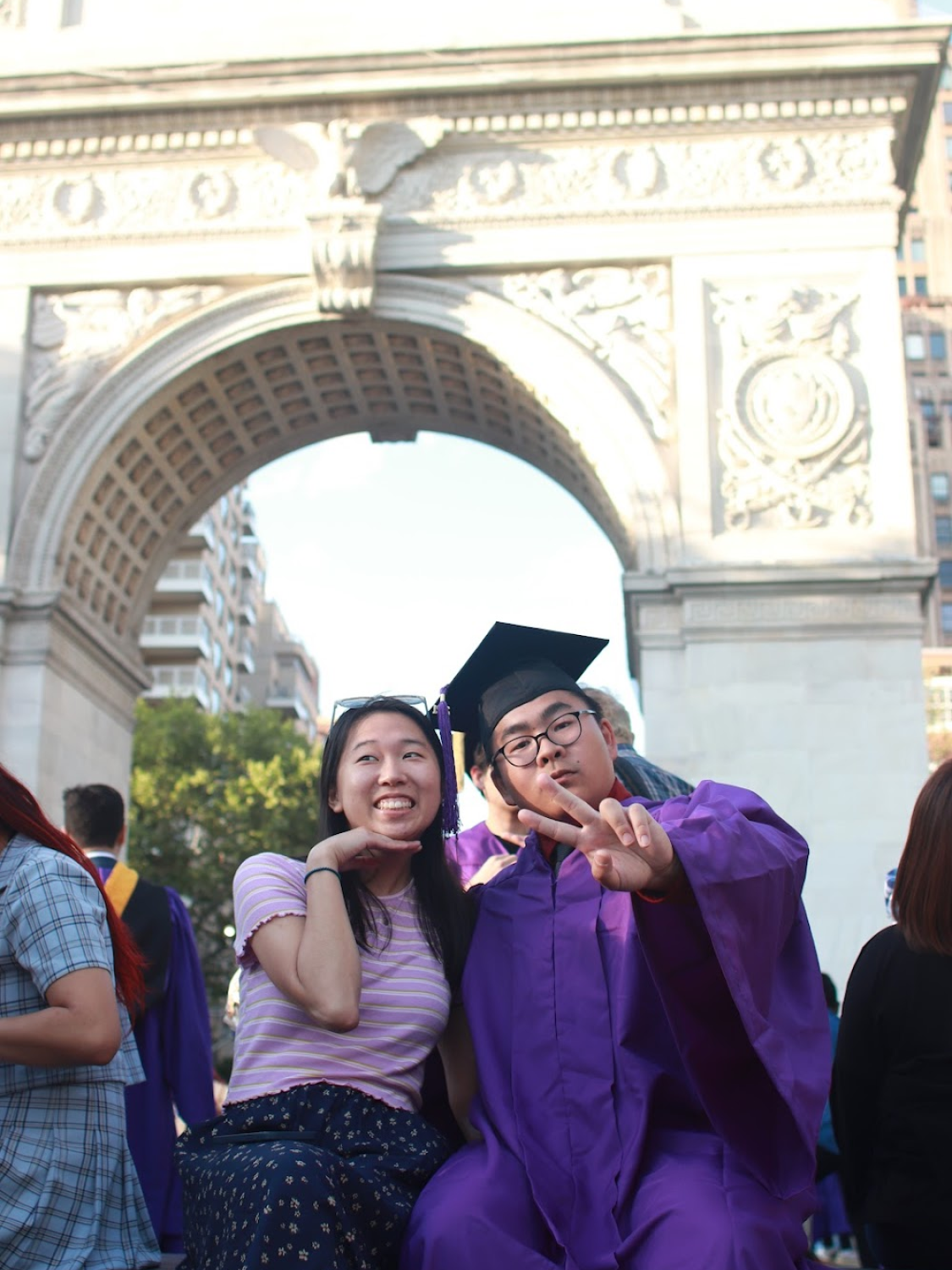 With the NYU grad under the Washington Square Arch