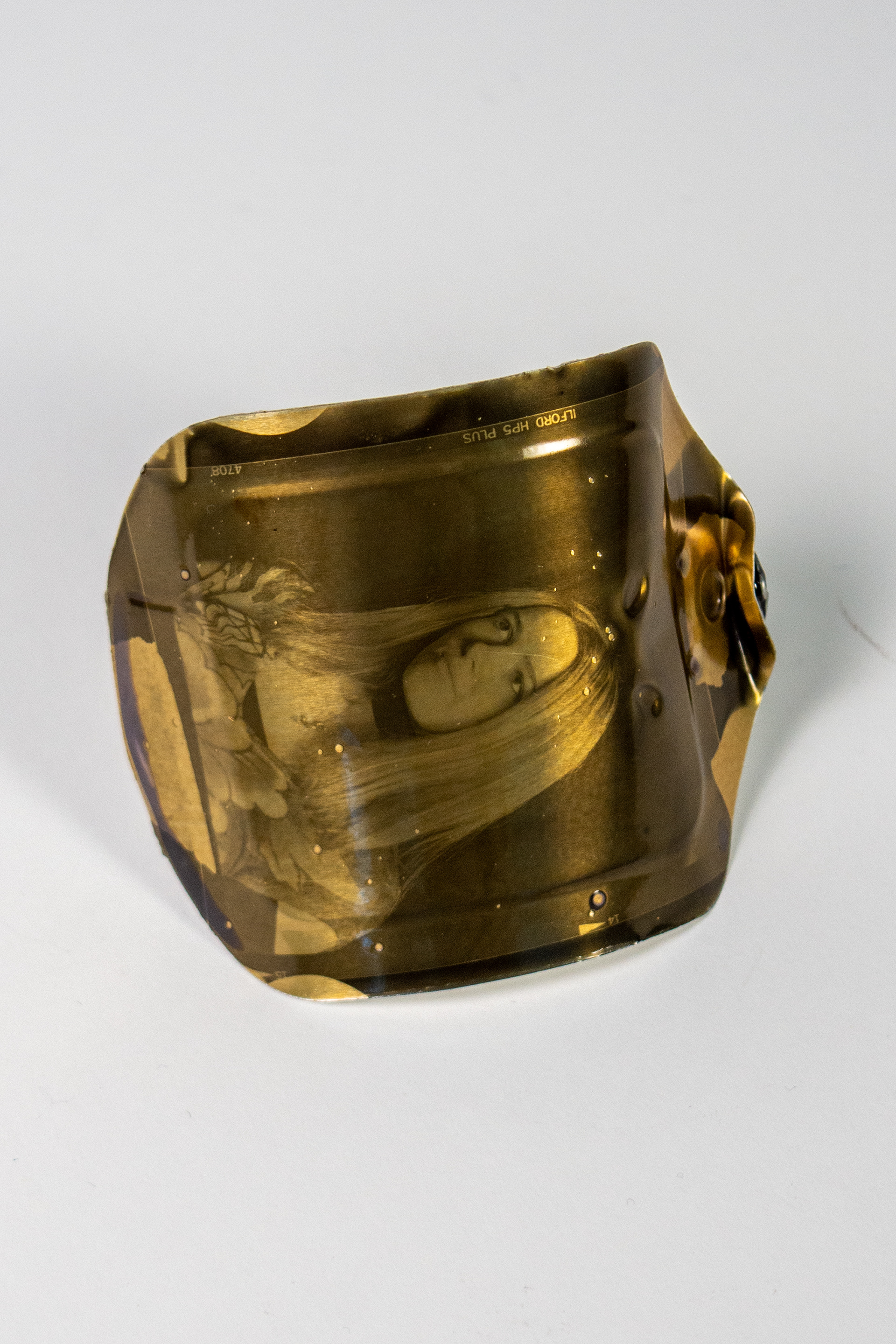 "preservation" 2024 Liquid Light emulsion on Sardine can 4x2x1in