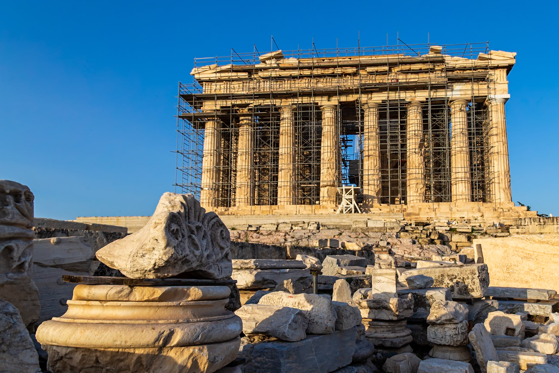 Acropolis, Athens, Greece - May 23rd 2018: The Parthenon is undergoing restoration, with scaffolding visible. The ruins are being preserved for future generations.