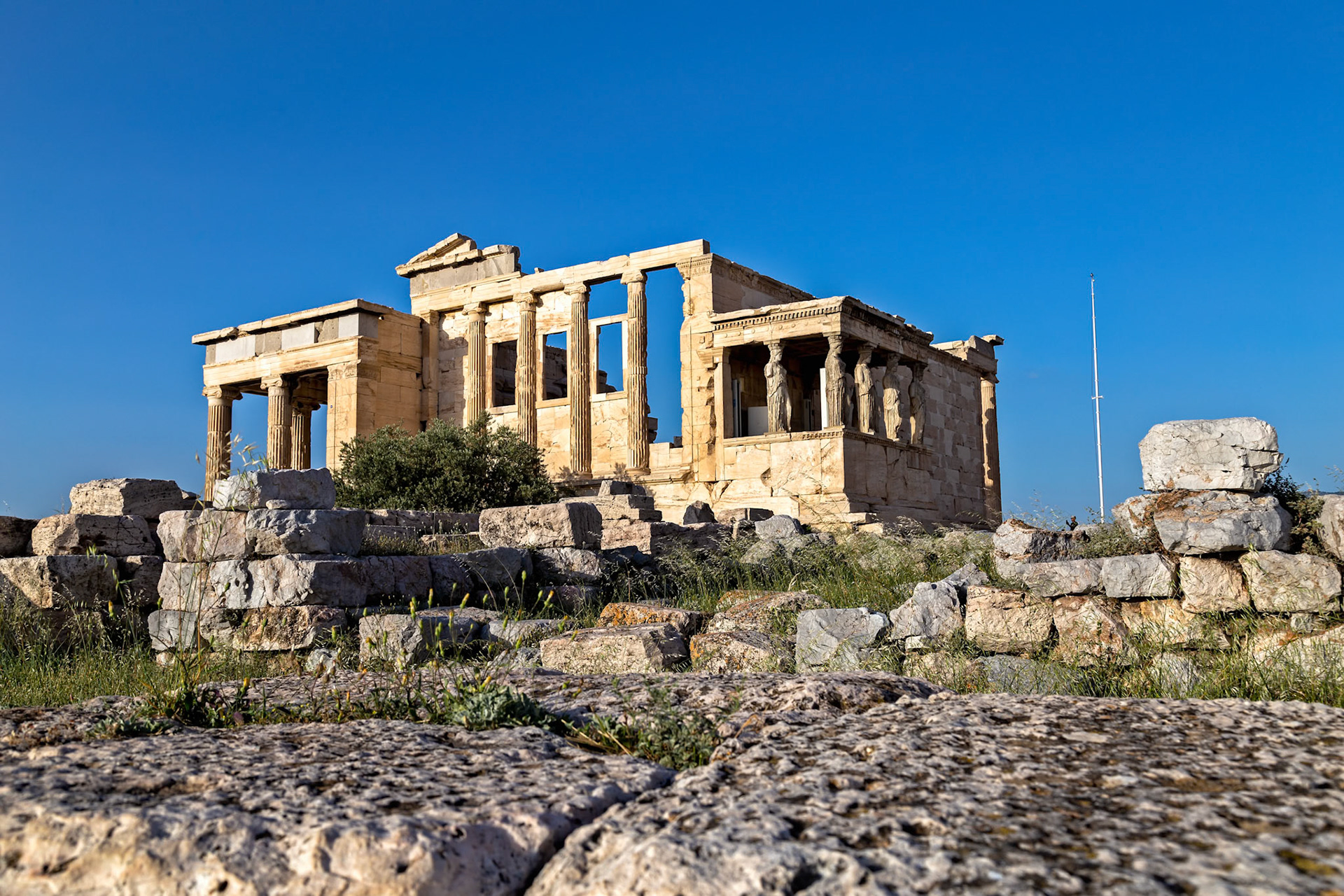 Acropolis, Athens, Greece - May 23rd 2018: The Erechtheion, an ancient Greek temple, stands on the north side of the Acropolis, showcasing its iconic architecture.