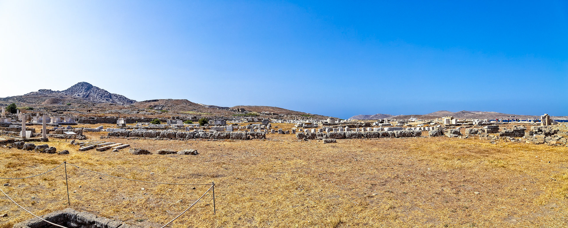 Delos, Greece - May 22nd 2018: Ruins of ancient structures stand on Delos, a Greek island and archaeological site, offering a glimpse into its rich history and cultural significance.