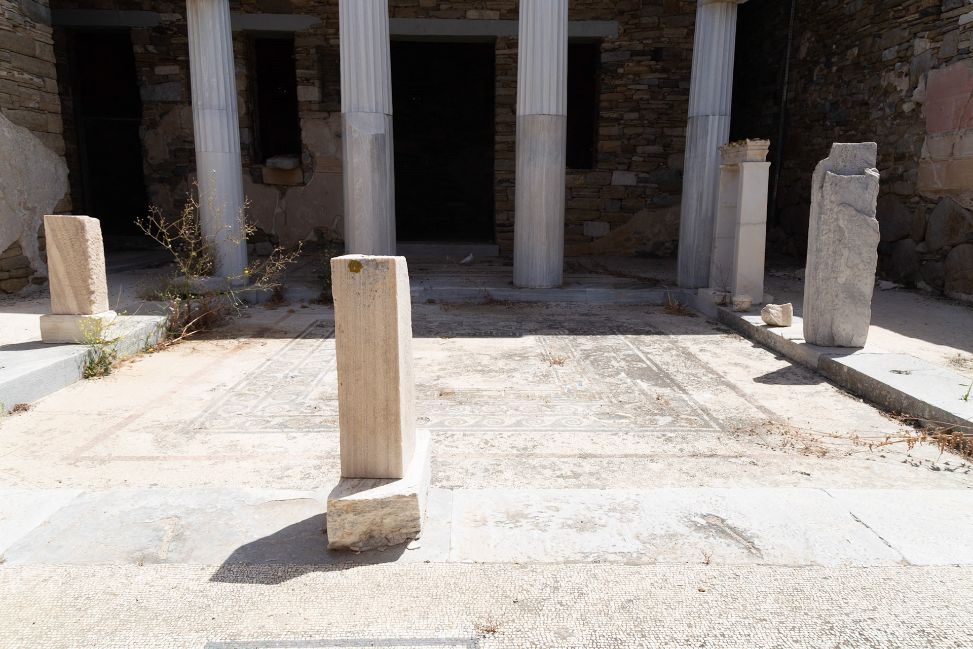 Delos, Greece - May 22nd 2018: Ancient ruins stand as a testament to Delos's rich history, showcasing the architectural prowess of a bygone era.
