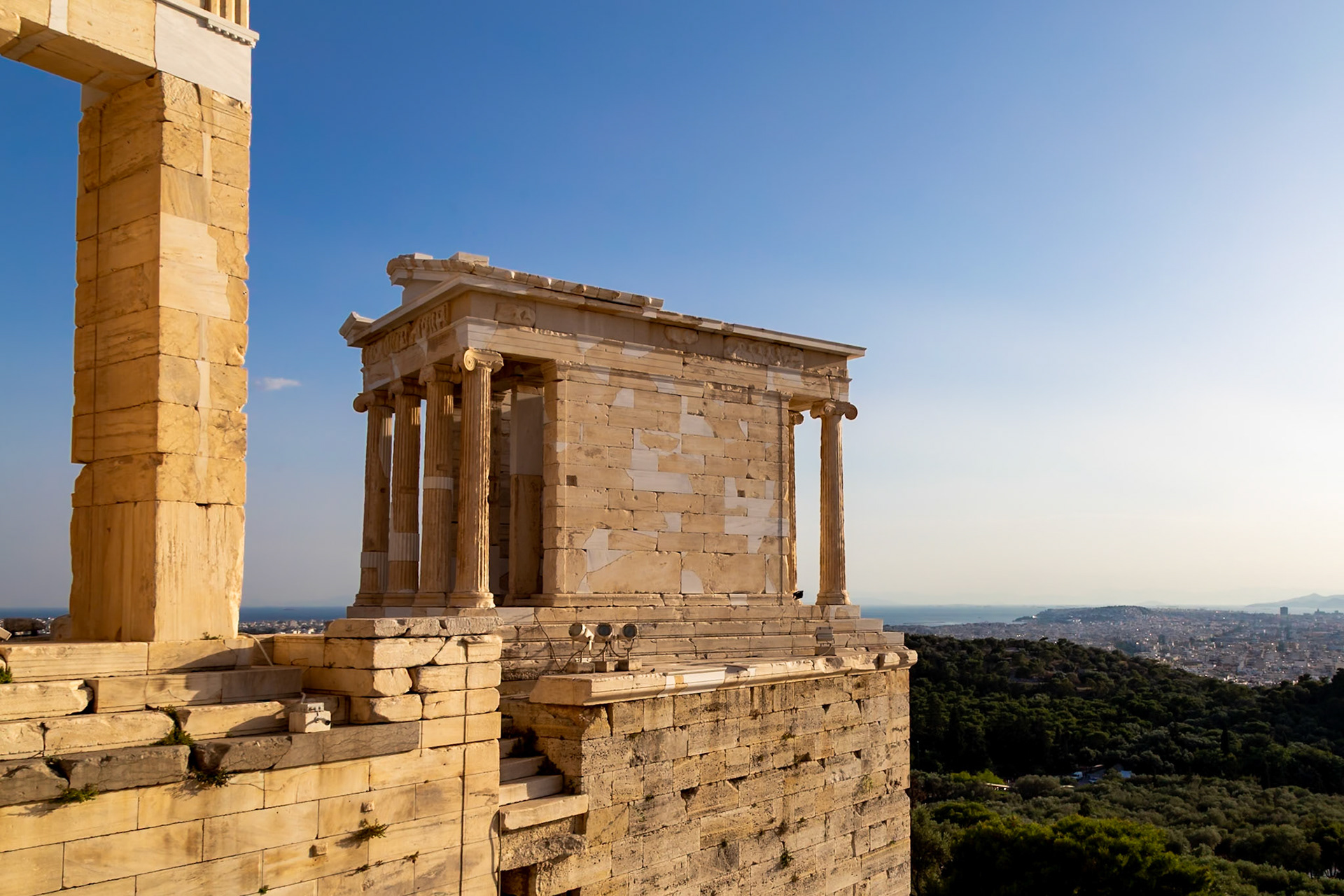 Acropolis, Athens, Greece - May 23rd 2018: The Temple of Athena Nike stands as a testament to ancient Greek architecture and religious practices.