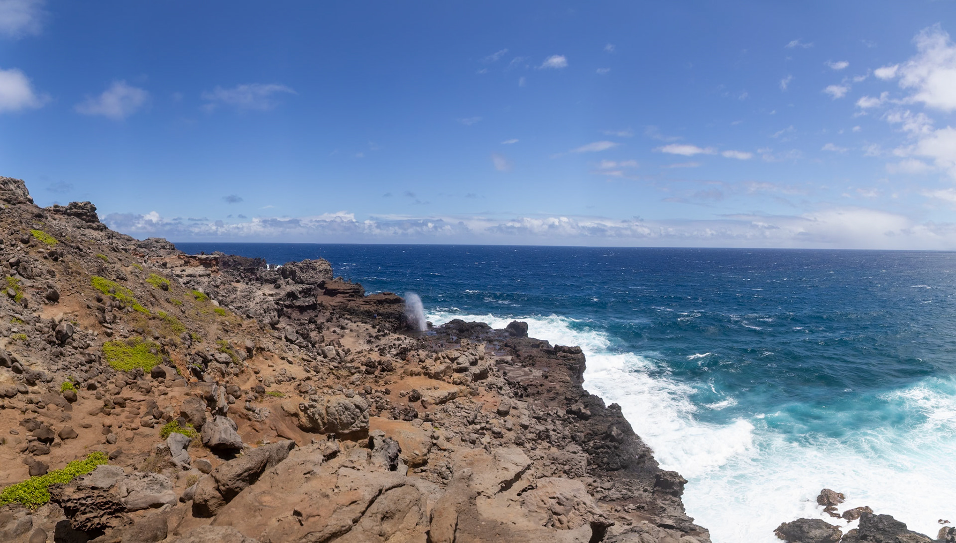 Maui, Hawaii, USA - April 9th 2022: Waves crash against the rocky coastline, creating a dramatic display of nature's power and beauty.