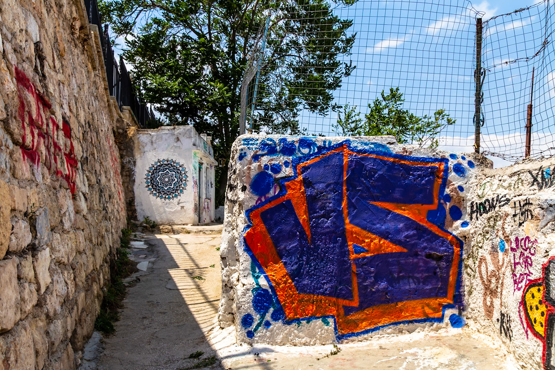 Athens, Greece - May 23rd 2018: Graffiti art adorns walls in Athens, showcasing the city's vibrant street culture and artistic expression.