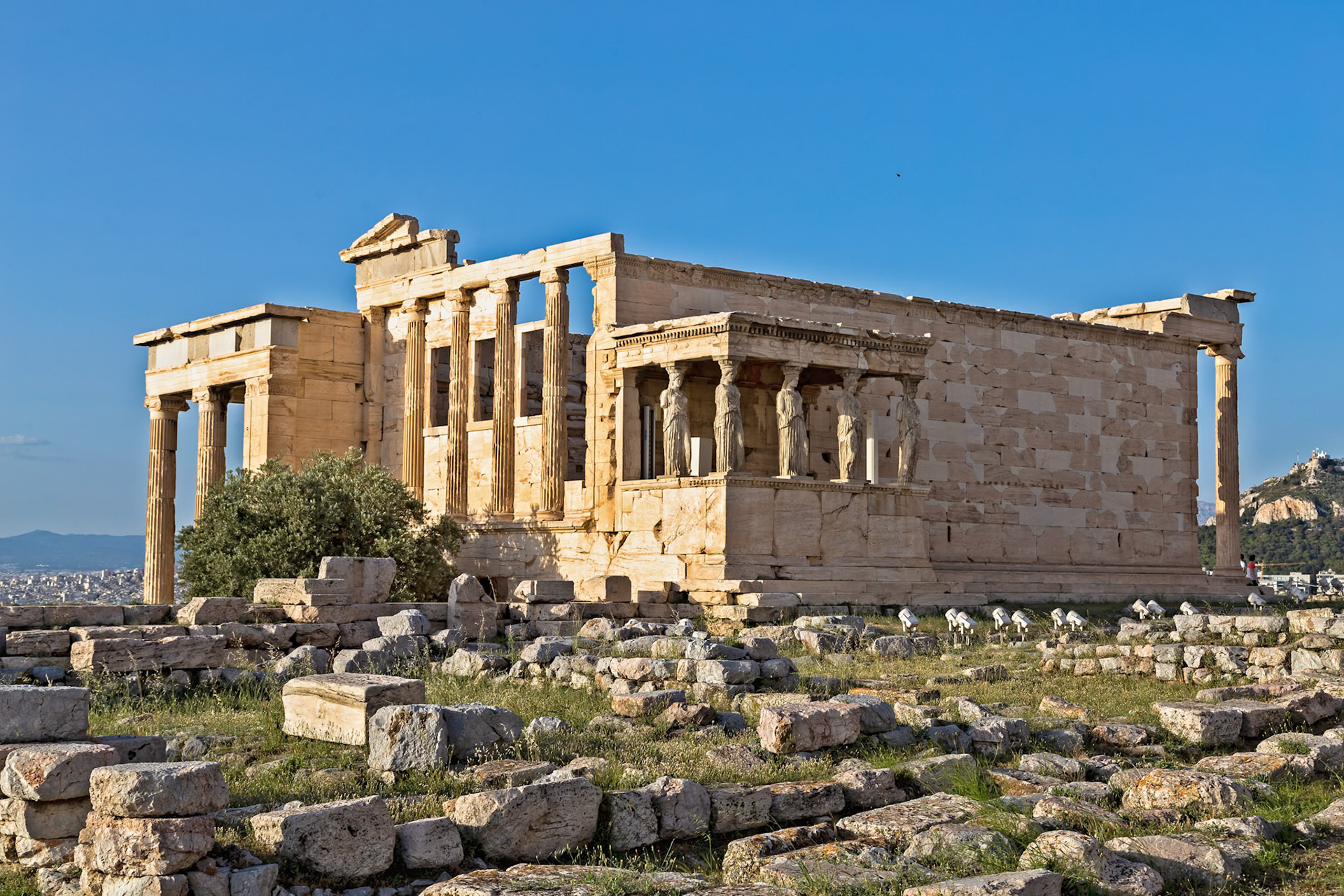 Acropolis, Athens, Greece - May 23rd 2018: The Erechtheion, an ancient Greek temple, stands on the north side of the Acropolis, a testament to history.