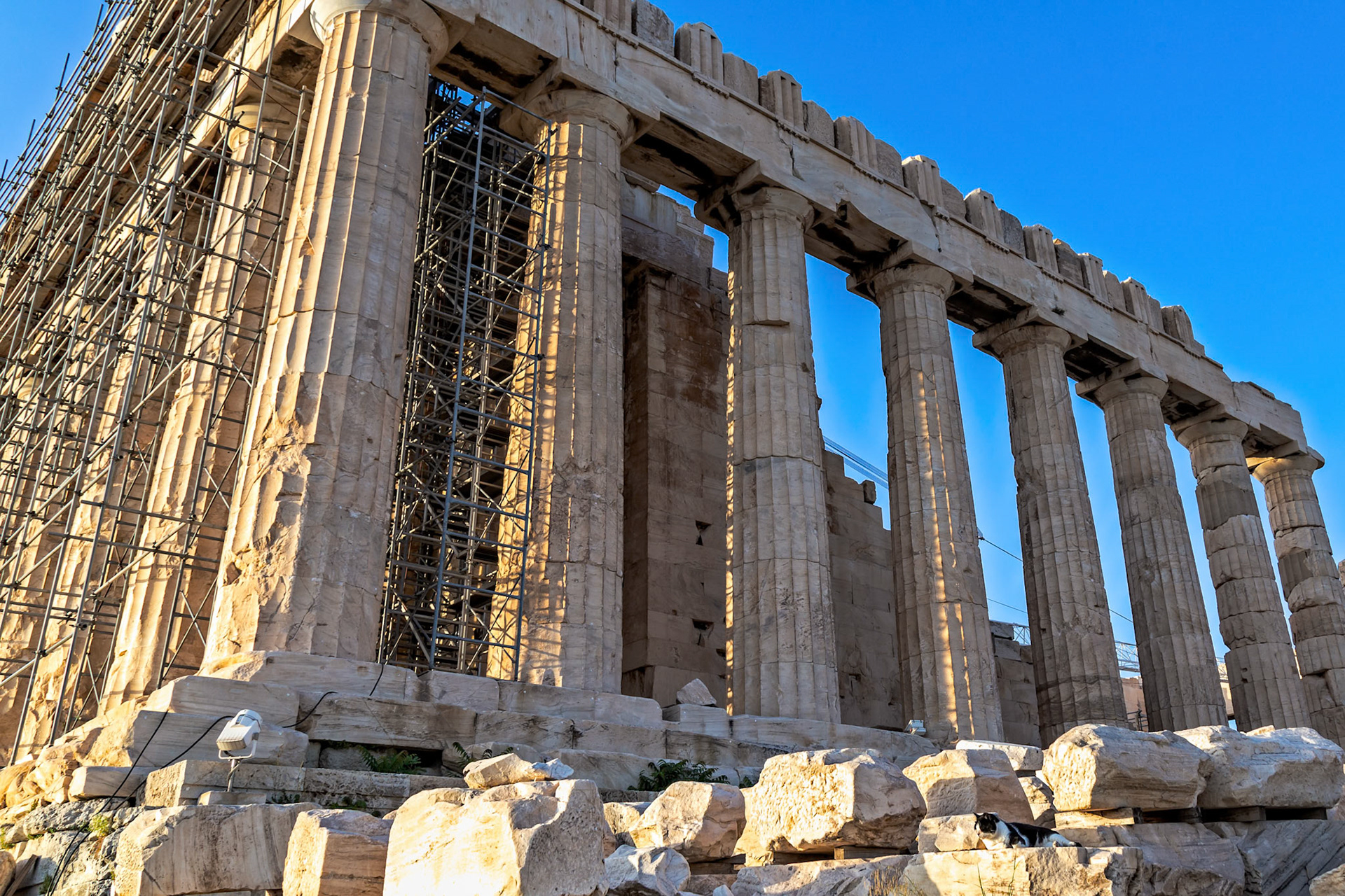 Acropolis, Athens, Greece - May 23rd 2018: The Parthenon undergoes restoration, with scaffolding supporting its ancient columns, preserving history.