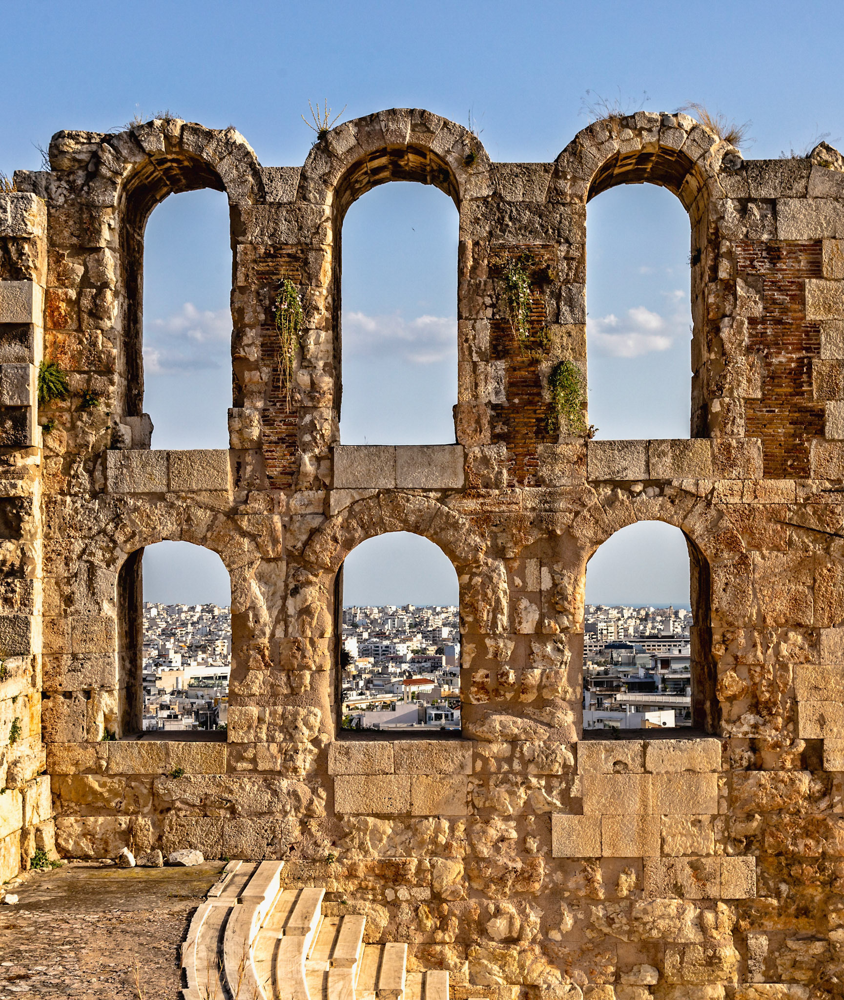 Acropolis, Athens, Greece - May 23rd 2018: The Odeon of Herodes Atticus stands as a testament to ancient Greek architecture, offering a glimpse into history.