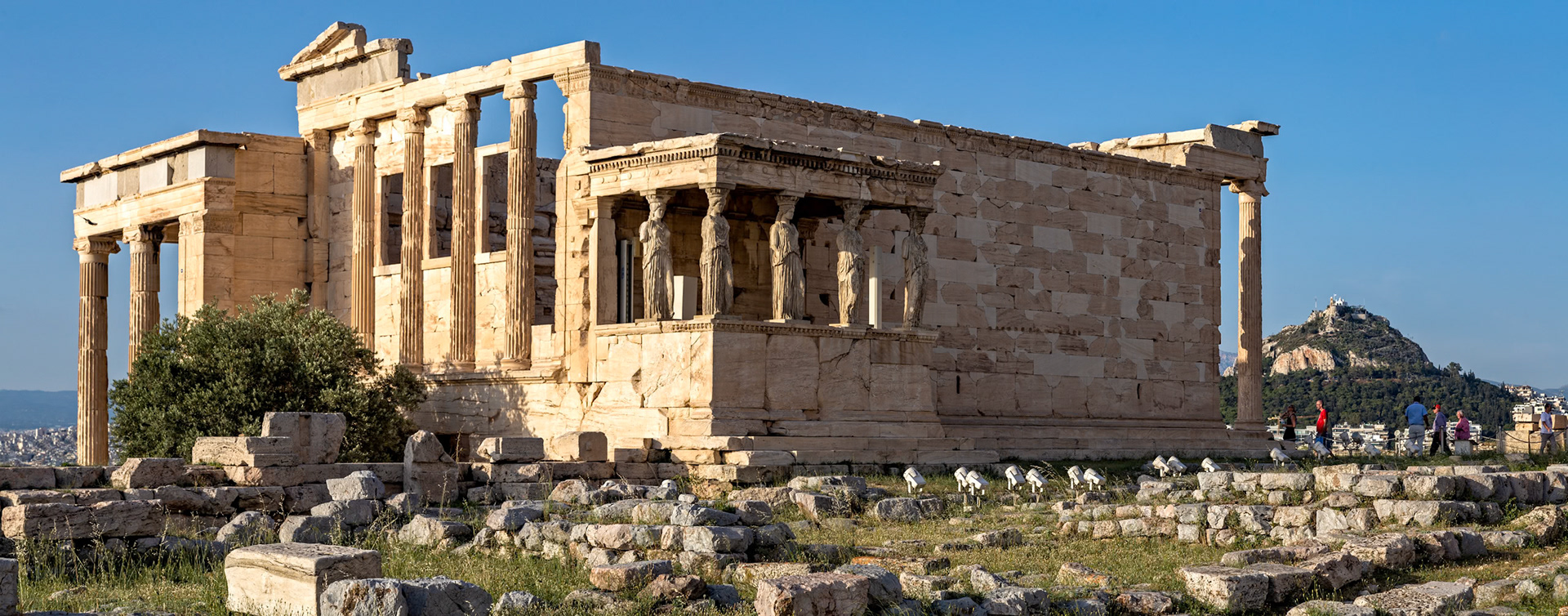 Acropolis, Athens, Greece - May 23rd 2018: The Erechtheion, an ancient Greek temple, stands as a testament to Athenian architecture and religious significance.