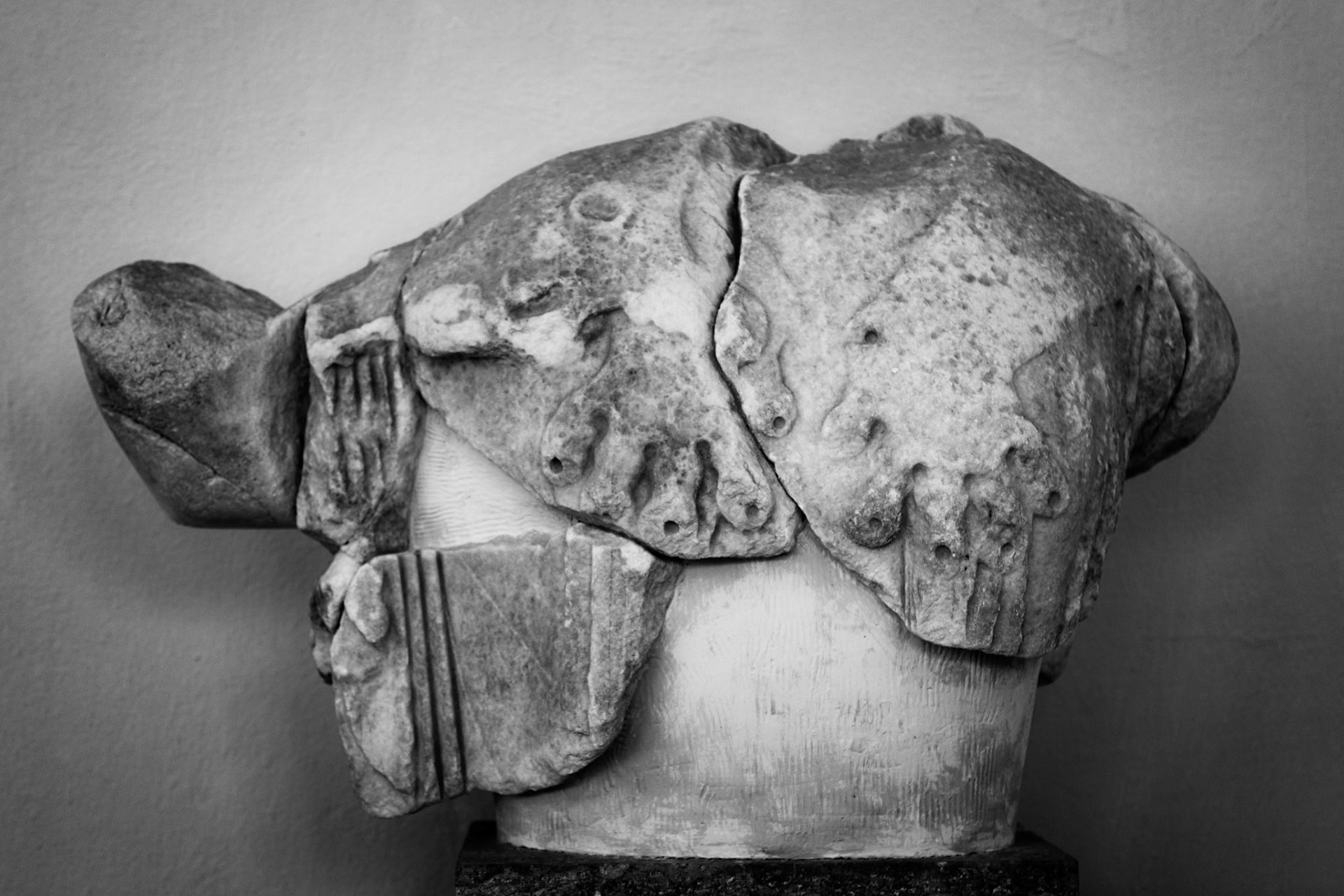 Delos, Greece - May 22nd 2018: A fragmented lion statue stands as a testament to Delos's rich history, inviting reflection on the island's past glory.