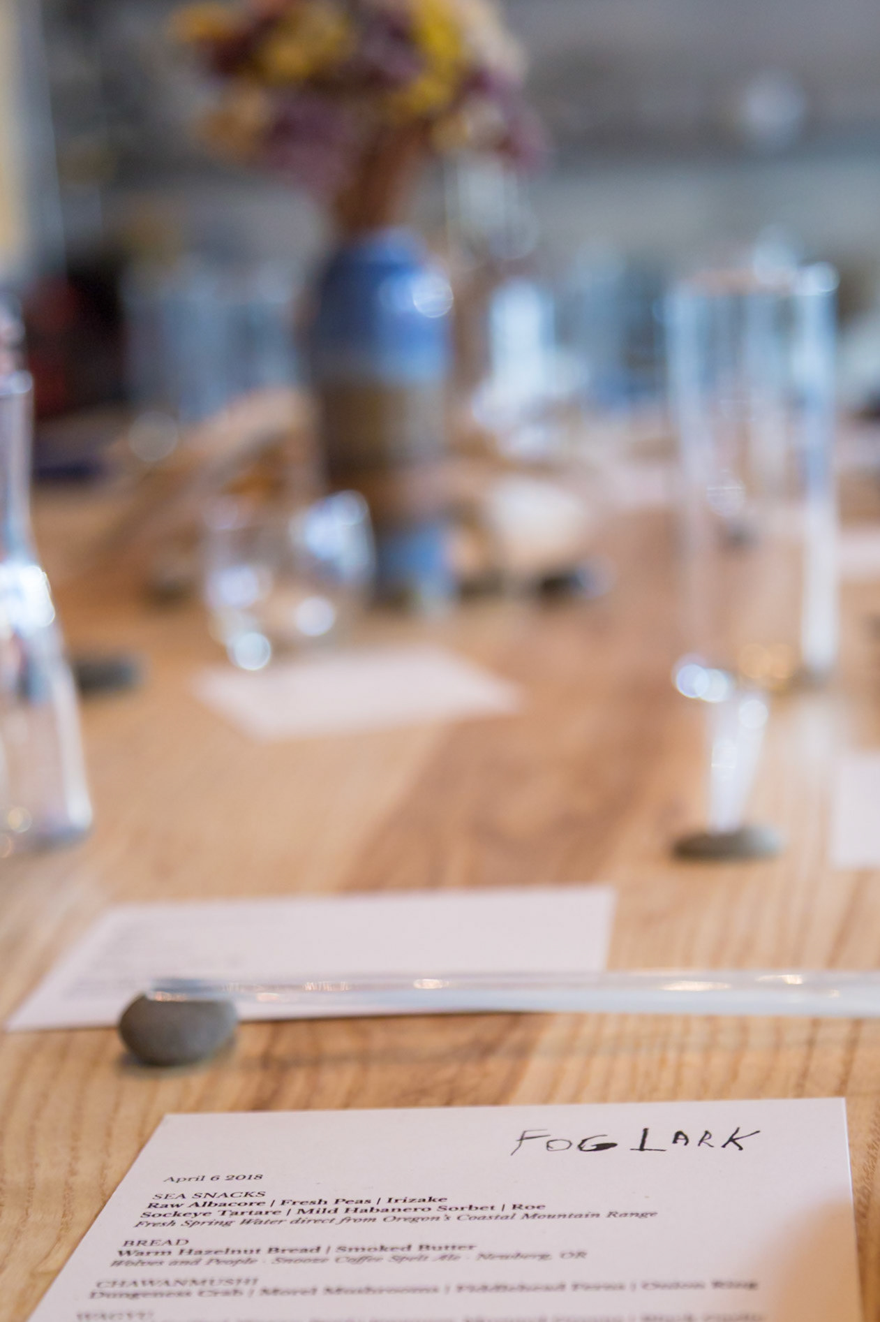 Fog Lark, Portland, Oregon - April 6th 2018: A menu for a meal at Fog Lark, featuring sea snacks, bread, and chawanmushi.