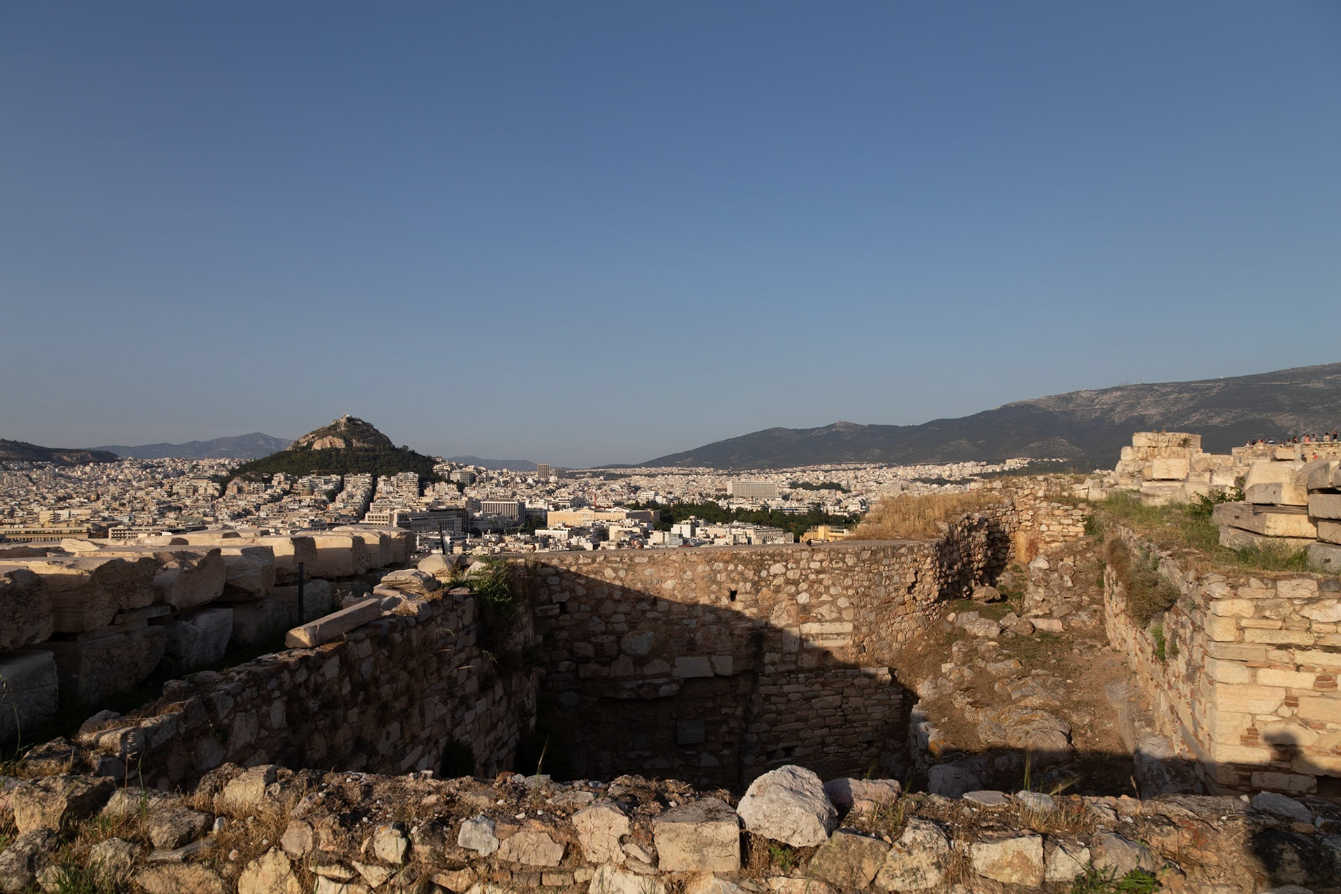 Acropolis, Athens, Greece - May 23rd 2018: A view of the city from the Acropolis, showcasing the ancient ruins and the modern cityscape beyond.