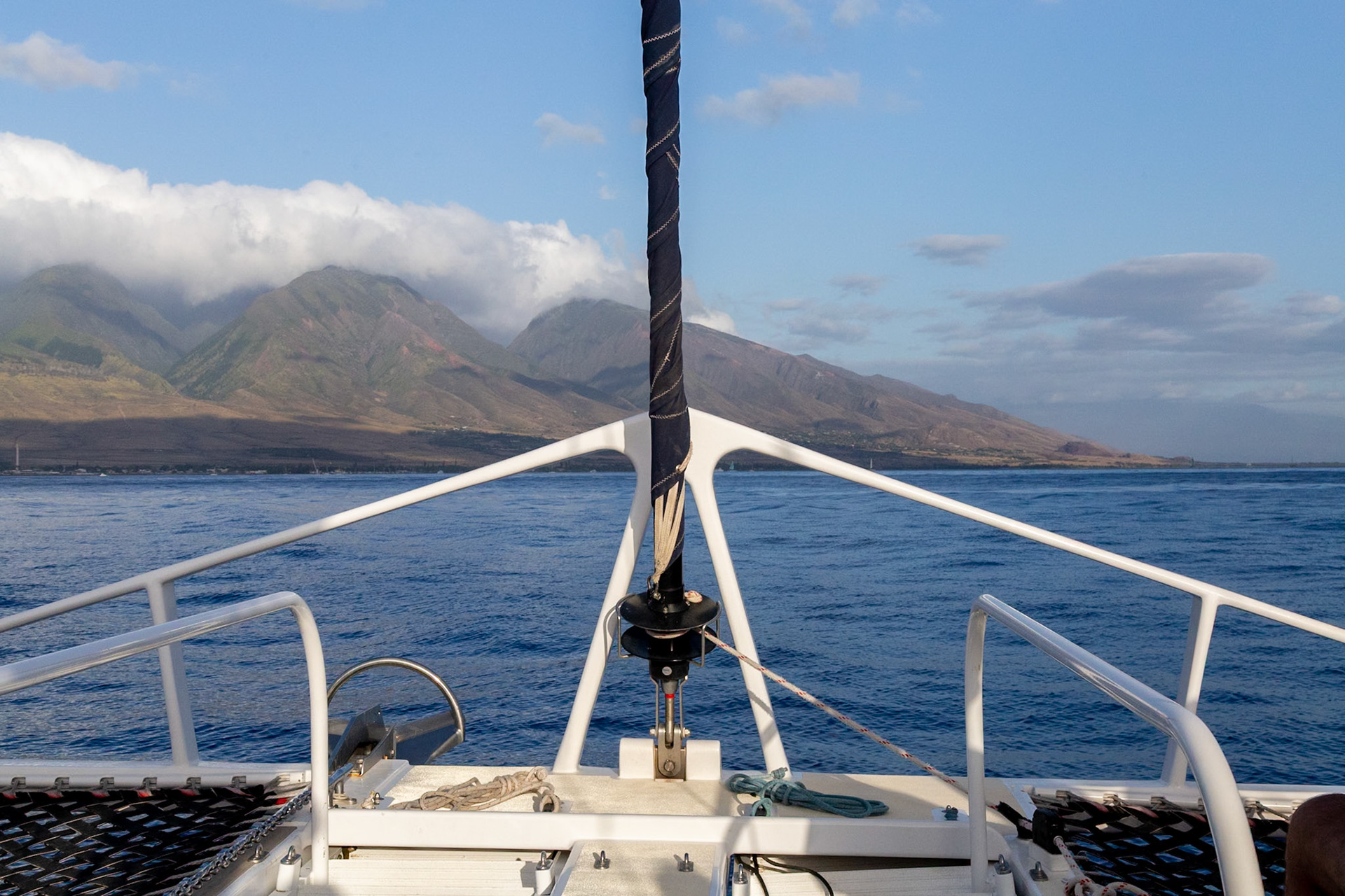 Maui, Hawaii, USA - April 7th 2022: Sailing off the coast of Maui, enjoying the beautiful scenery and calm waters on a sunny day.