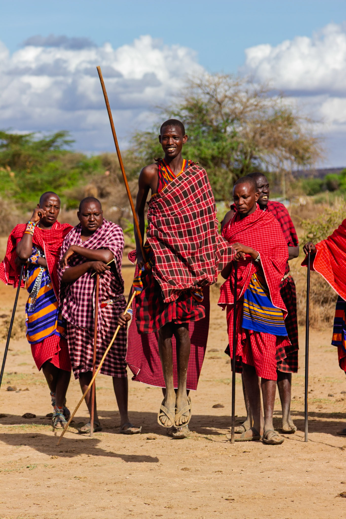 Maasai men in Kenya perform a jumping dance, a traditional display of strength and agility in their village.