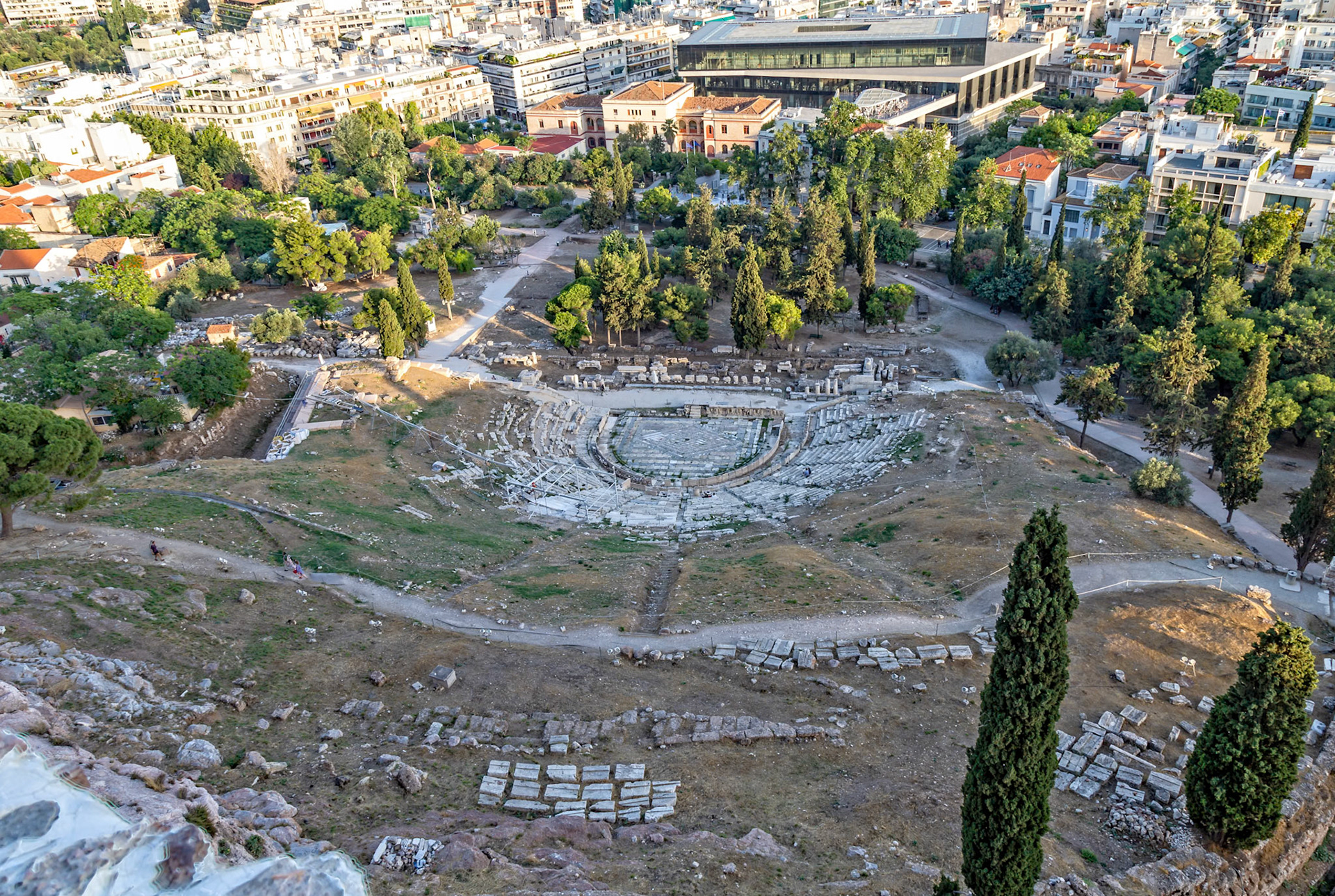 Acropolis, Athens, Greece - May 23rd 2018: Aerial view of the ancient Theatre of Dionysus, a major open-air theatre and important Athenian landmark.