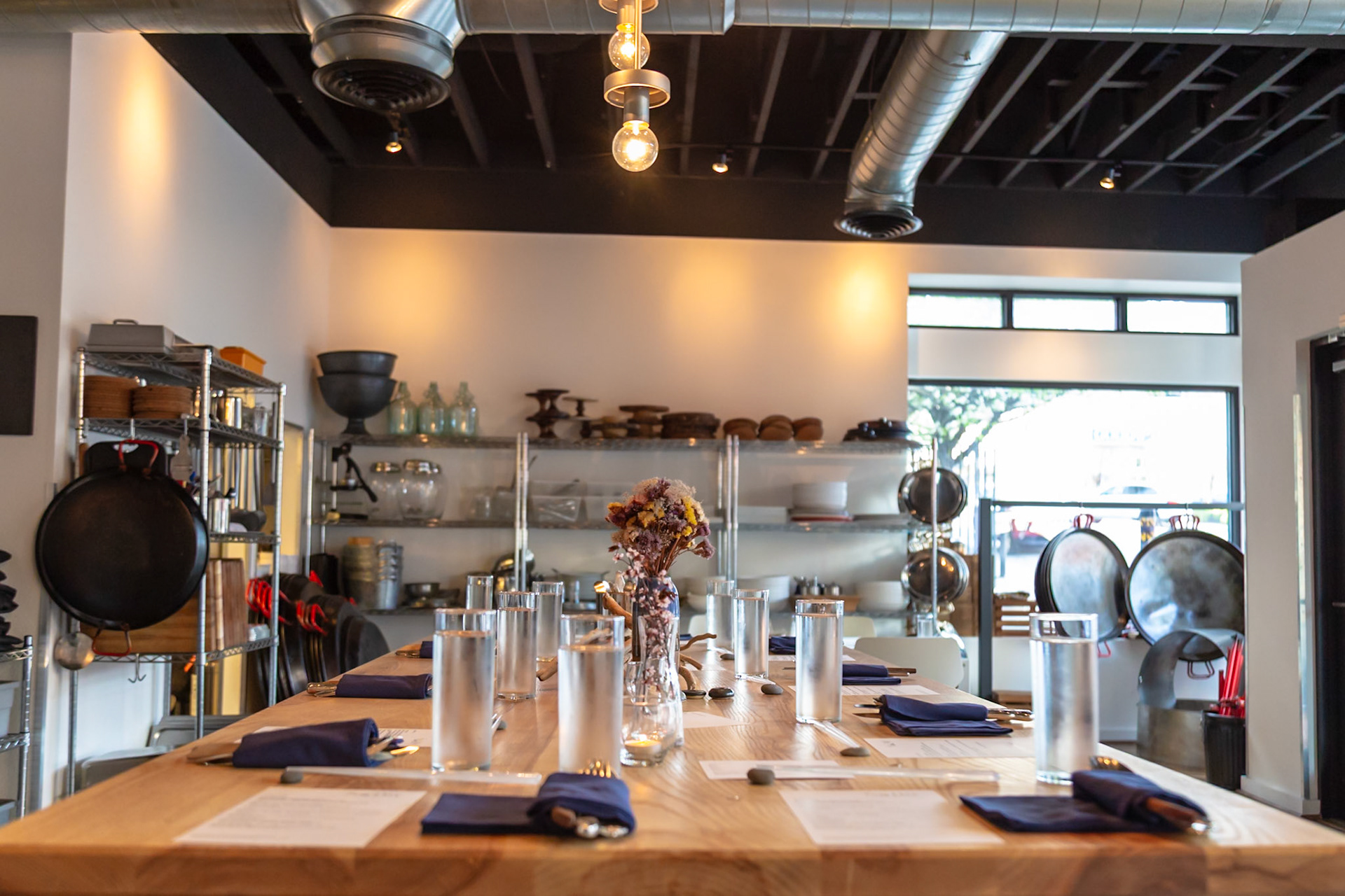 Fog Lark, Portland, Oregon - April 6th 2018: A dining table is set for a meal, awaiting guests in a restaurant setting.
