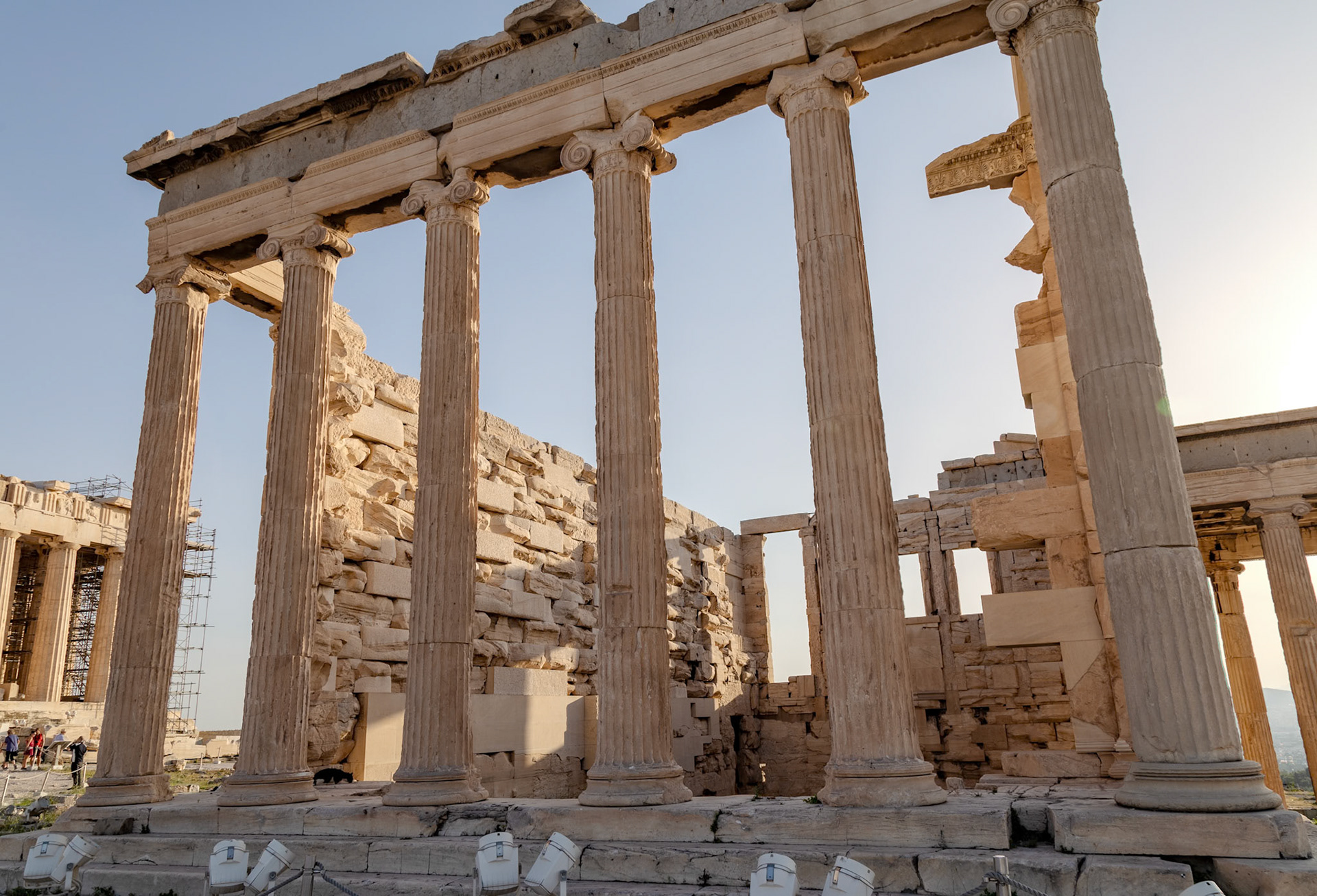 Acropolis, Athens, Greece - May 23rd 2018: The Erechtheion, an ancient Greek temple, stands on the north side of the Acropolis, showcasing its iconic columns.