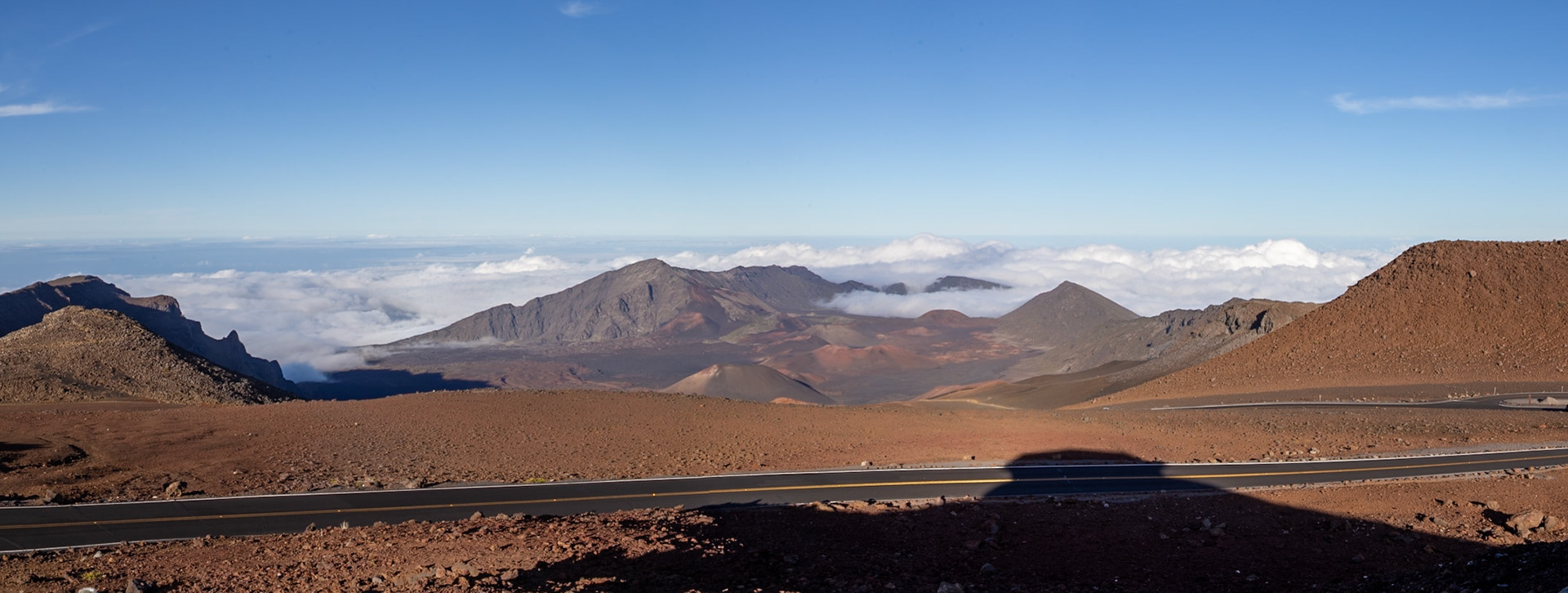 Haleakala, Maui, Hawaii - April 10th 2022: A scenic view of the Haleakala volcano crater, showcasing its unique landscape and the road leading through it.