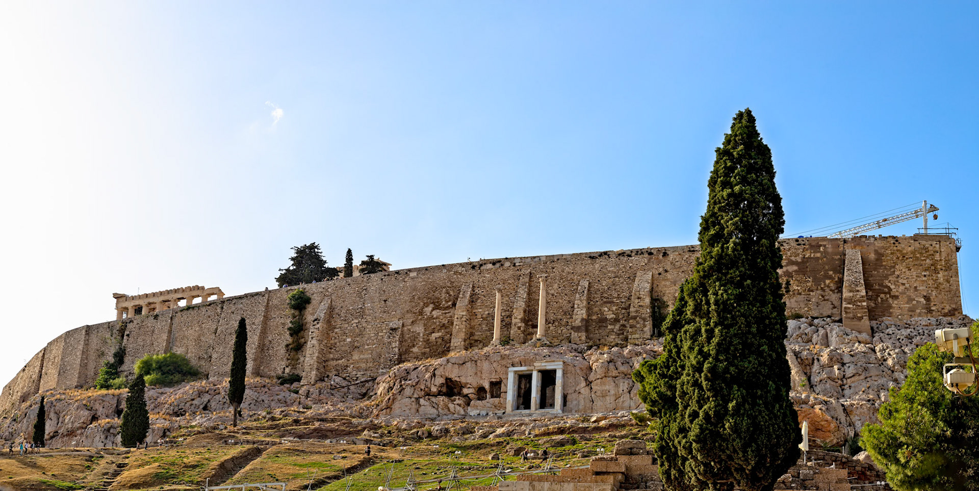 Acropolis, Athens, Greece - May 23rd 2018: A view of the Acropolis, a historic citadel containing the remains of several ancient buildings of great architectural significance.