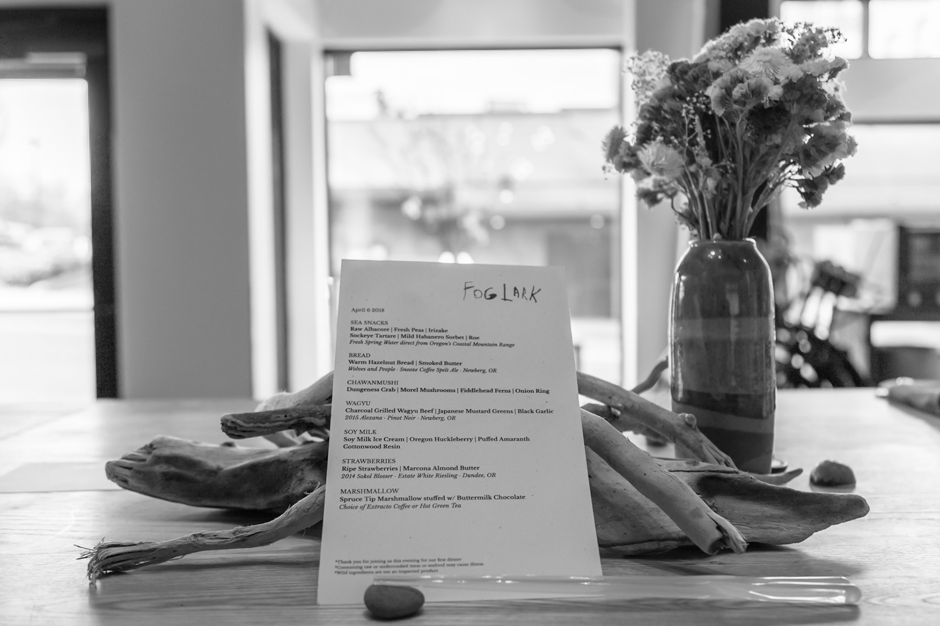 Fog Lark, Portland, Oregon - April 6th 2018: A menu from Fog Lark restaurant featuring sea snacks, bread, wagyu, and marshmallow.