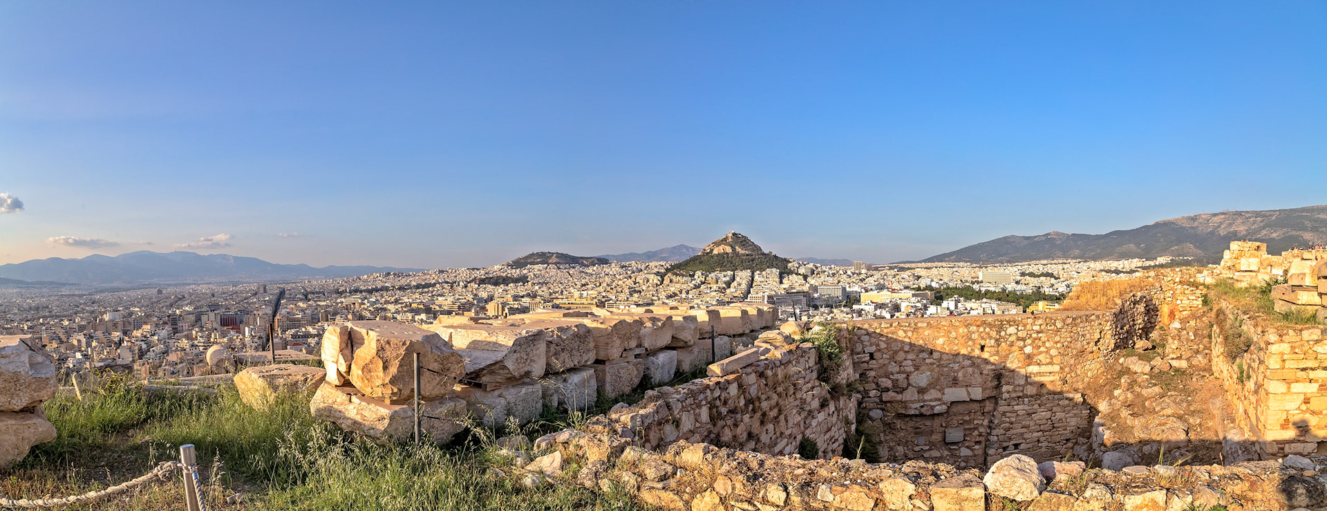 Acropolis, Athens, Greece - May 23rd 2018: A panoramic view of Athens from the Acropolis, showcasing the city's sprawl and ancient ruins.