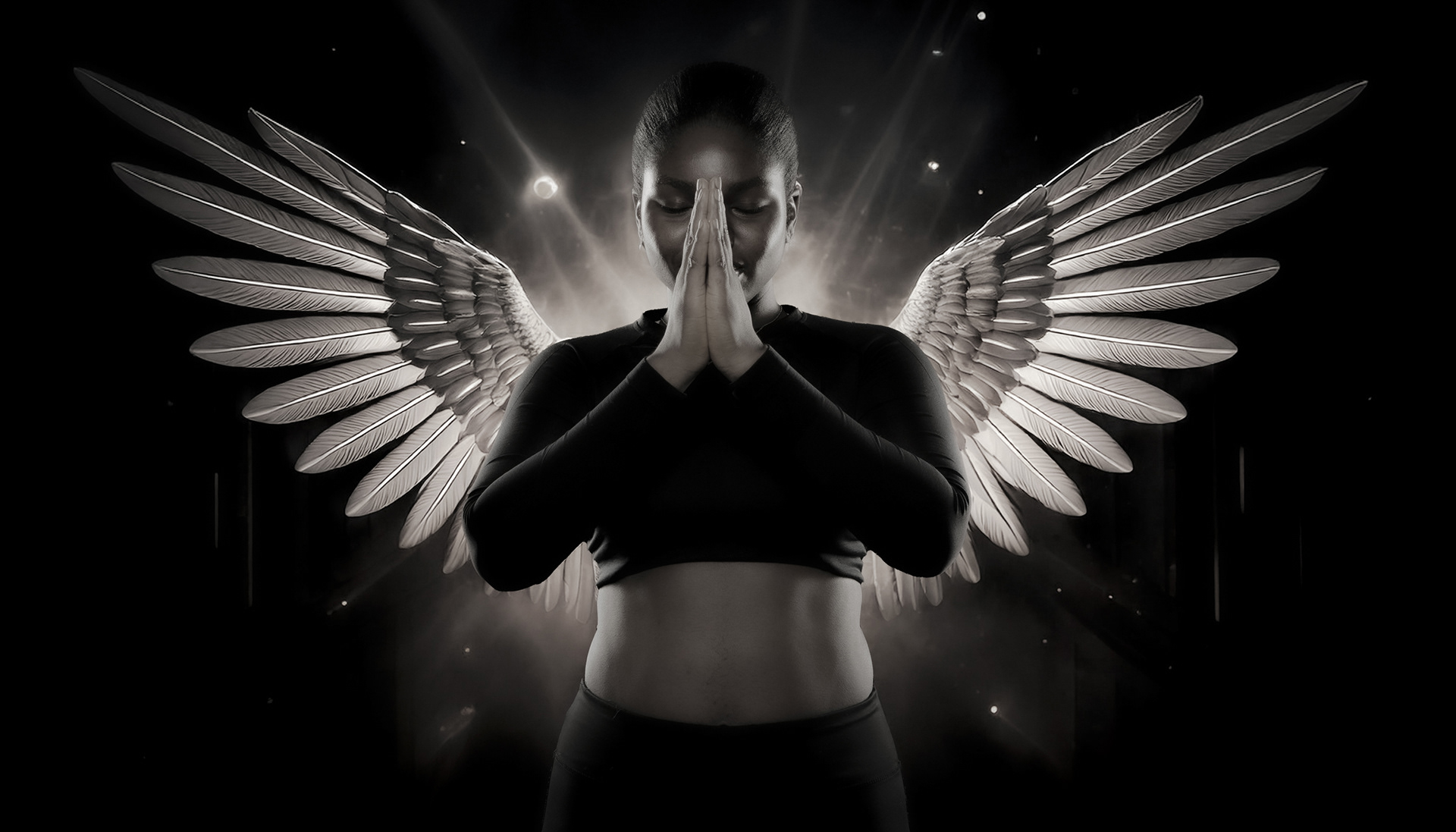 "A digitally enhanced artistic image of a woman dressed in black, standing with her hands pressed together in a prayer-like gesture. Behind her, large, luminous angelic wings extend outward, glowing against a dark cosmic background speckled with stars. Soft light radiates around her, adding a celestial and ethereal feel to the composition."