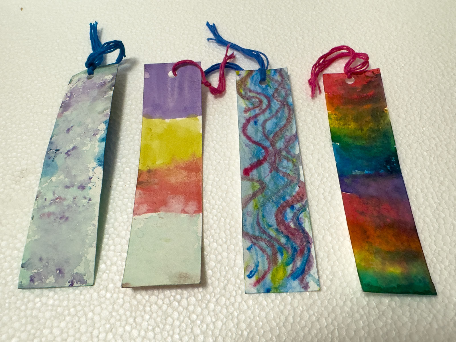 Watercolor book marks created by TK-2nd grade students