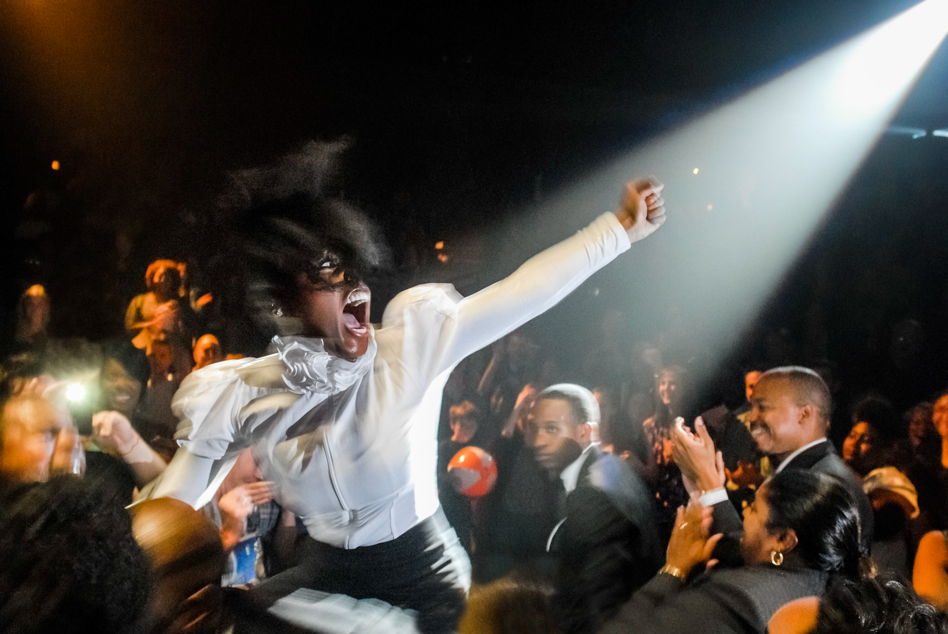 R&amp;B singer and actress Janelle Monae dances among the audience while performing the repertoire of her debut album The ArchAndroid at IdeaFest in Louisville, Kentucky, Sept. 29, 2010.