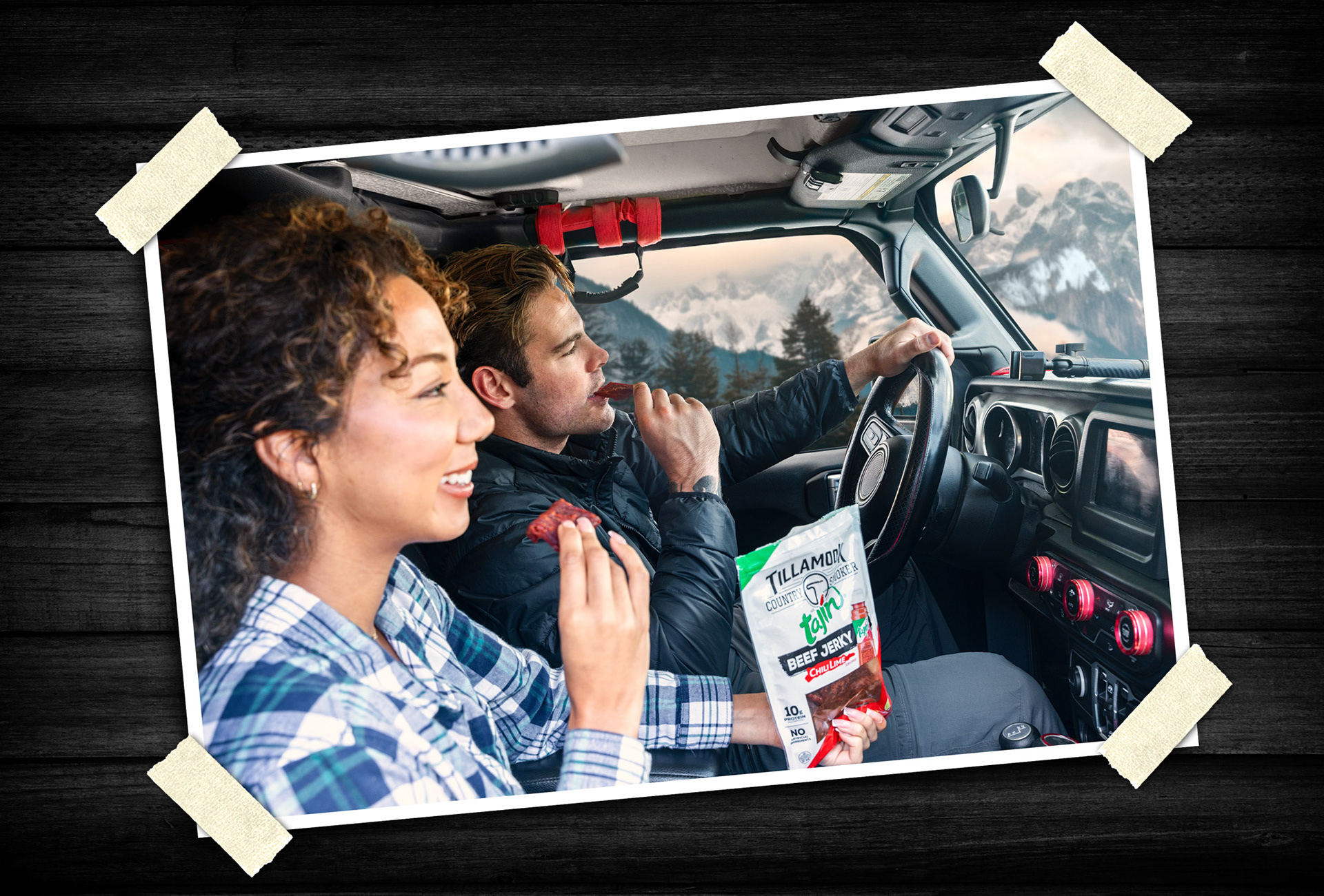 Lifestyle commercial imagery created to showcase an authentic road-trip experience featuring Tillamook Country Smoker beef jerky. The image combines natural interaction, environmental storytelling, and product placement to create a relatable and engaging brand moment.