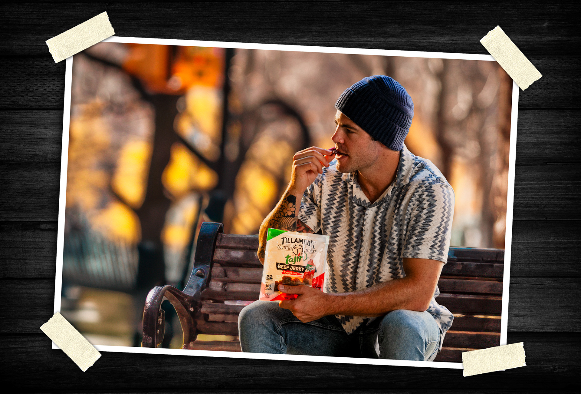 Lifestyle commercial photography capturing authentic moments and casual product interaction in an outdoor setting.