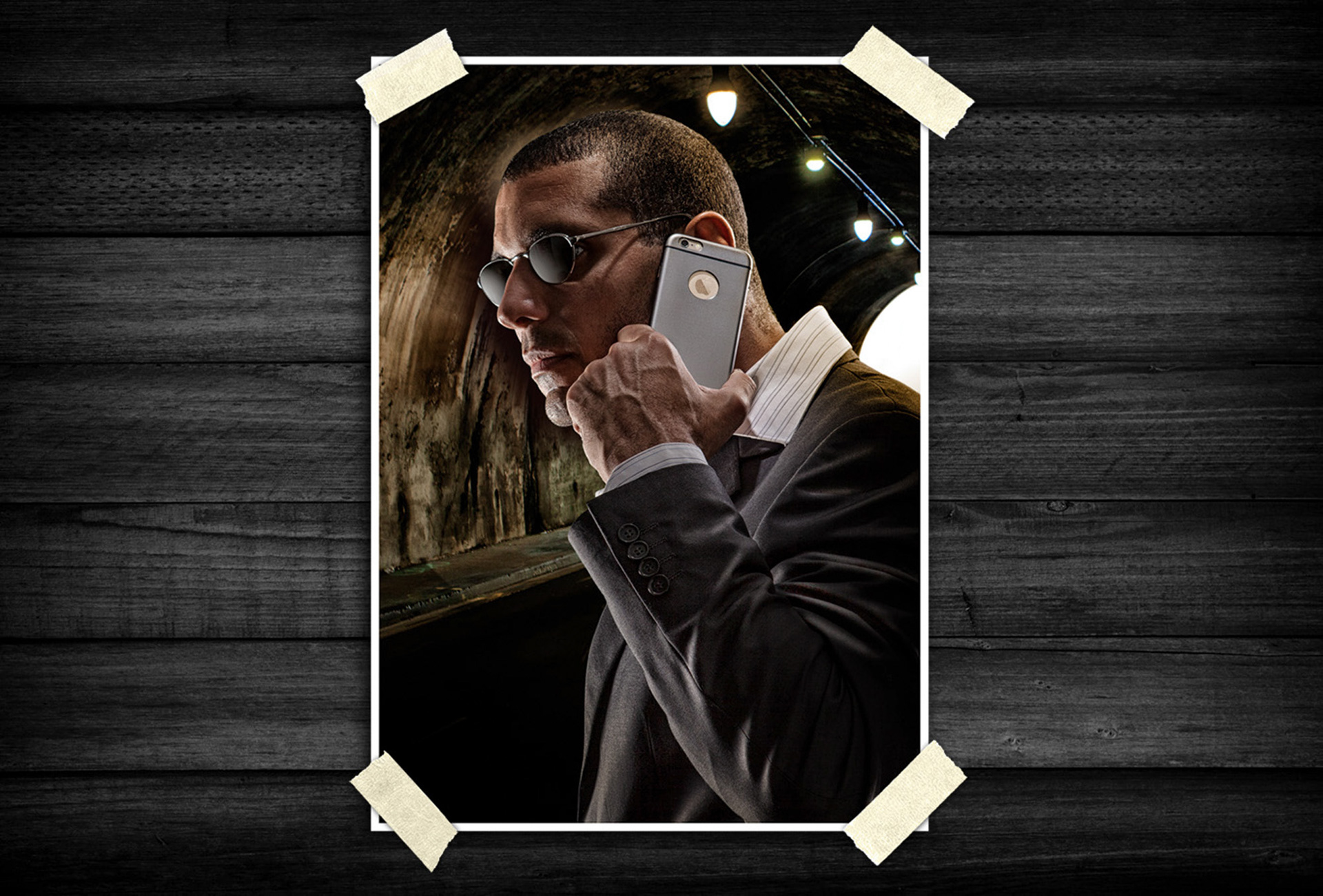 Stylized commercial portrait combining dramatic lighting and product emphasis for a bold visual approach.