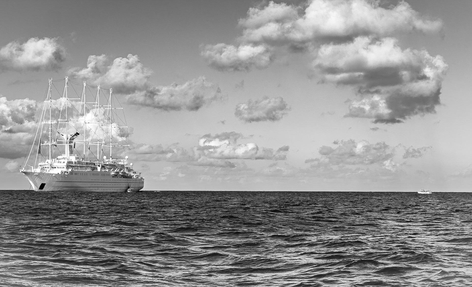 lifeboats used as shuttles hard at work moving folks to / from the WInd Surf for excursions ashore