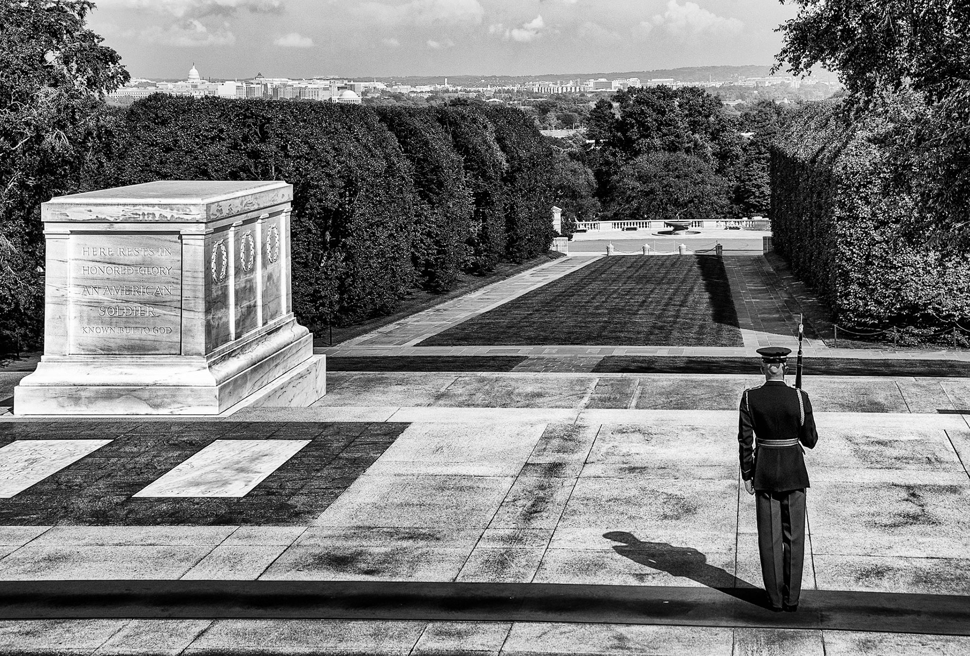 Here Rests In Honored Glory An American Soldier Known But To God.Not much else need really be said.I liked the composition for it's stoic emptyness and with just a sliver of the Washington, DC, skyline in the distance for context.