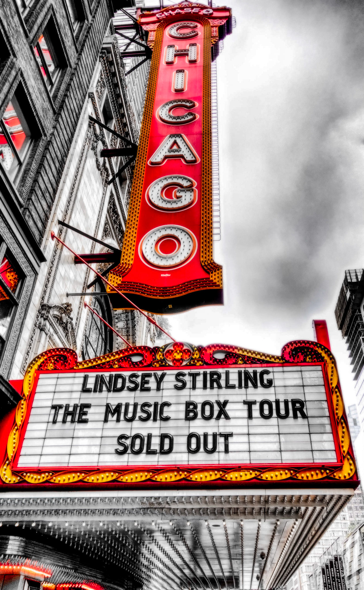 A foggy day in Chicago lends a mood to the Chicago Theater sign