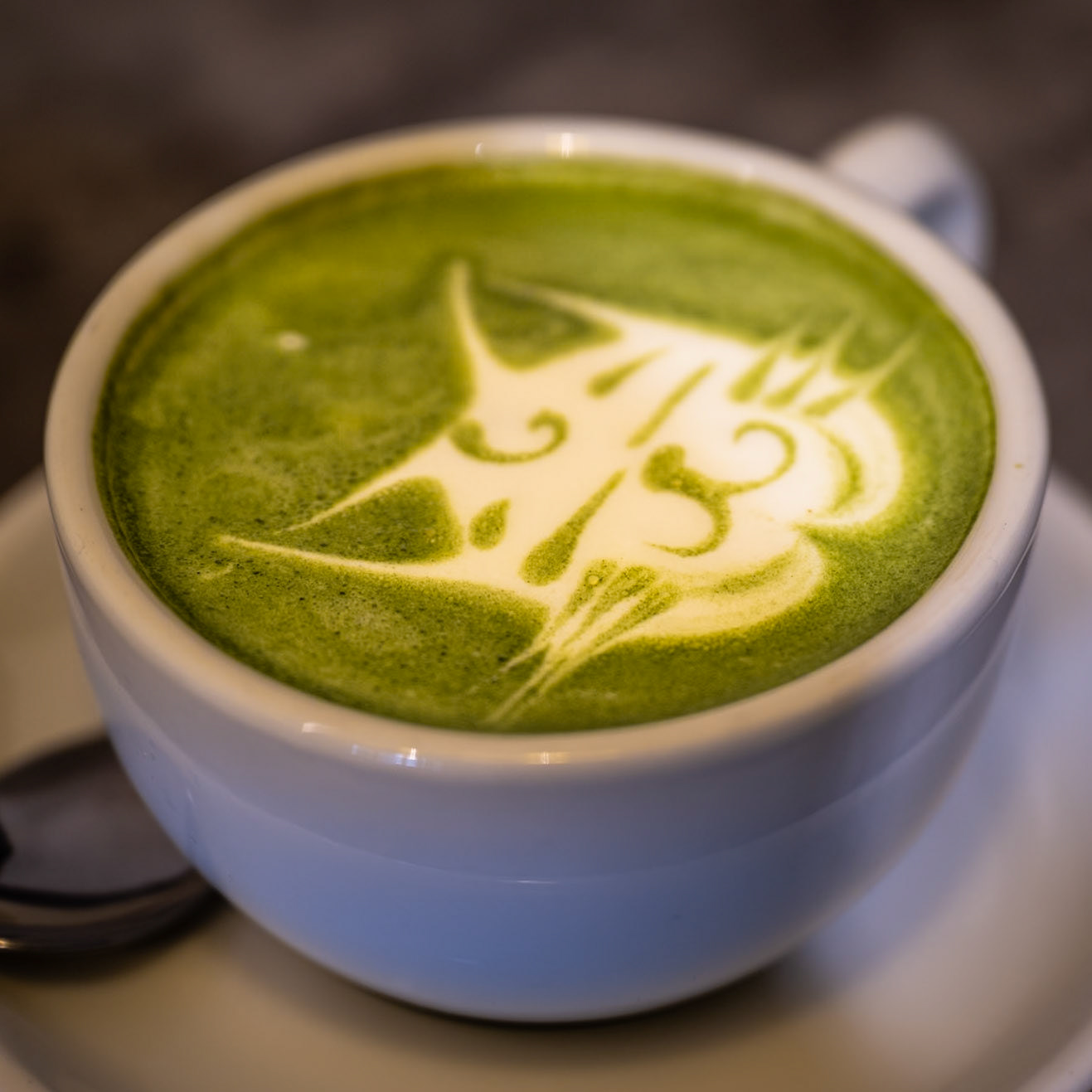 Apparently there was an artist working as barista making Paula's macha green tea :-D