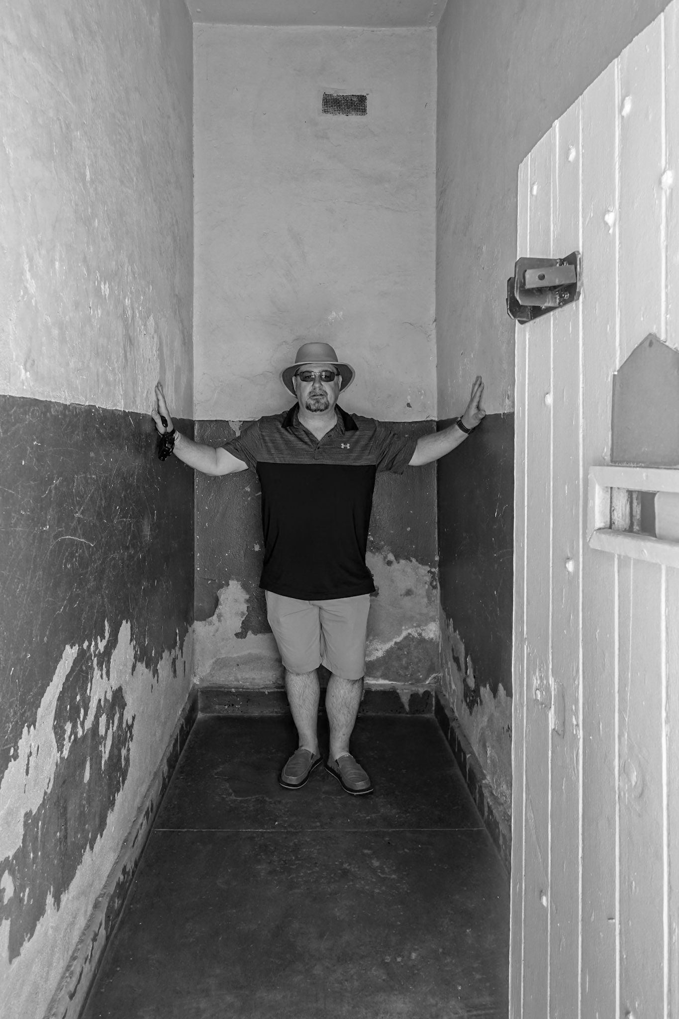 Brian in the standard prison cell Nelson Mandela and other political prisoners where imprisoned in while in South Africa.