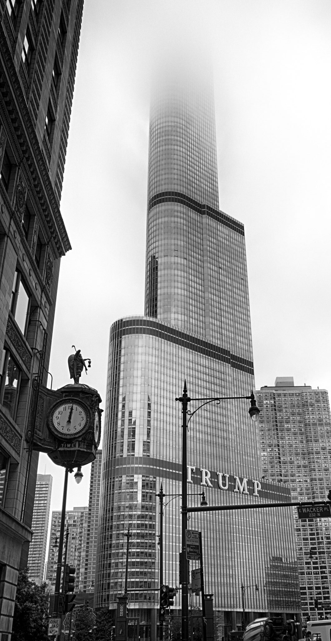 Trump Tower, Chicago, rises into the mist lending an eerie sense of perspective and scale as it vanishes into the sky.