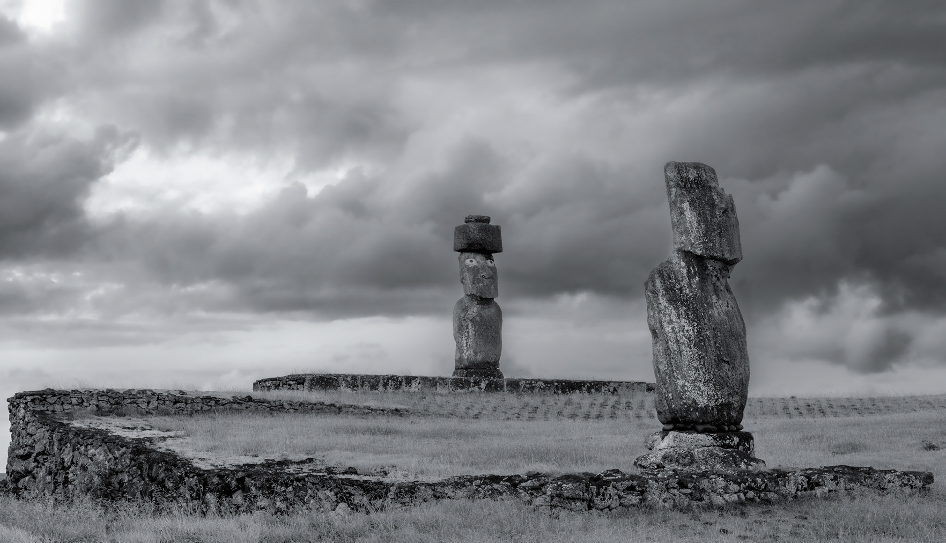 Eyes were traditionally added only after the Moai were erected in their final location. This is a restoration using traditional methods. Eyes were coral with black obsidian or red scoria pupils.